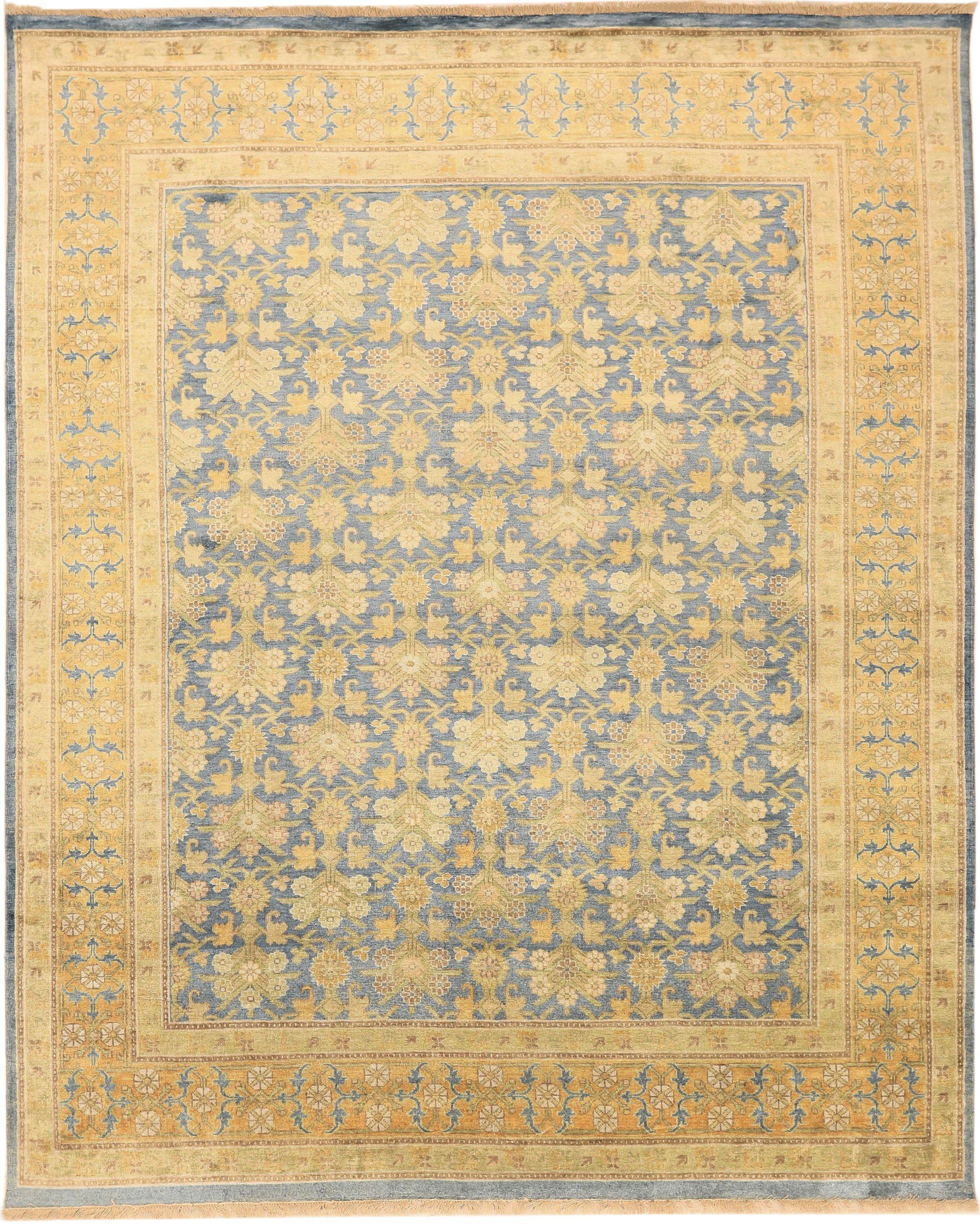 Découvrez l'élégance des tapis de l'Inde Khotan, datant de 1990. Conçu avec de la laine et du bleu/One, ce design exclusif est parfait pour mettre en valeur votre espace.