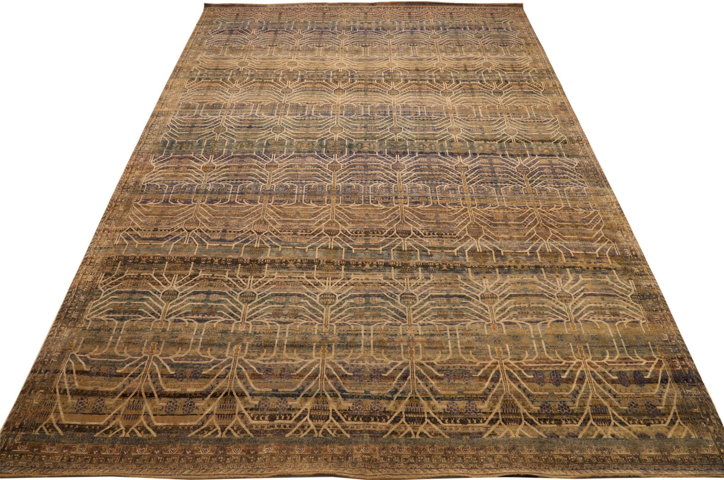Entdecken Sie die Eleganz von India Khotan mit dem Over-Size-Teppich von circa 1990. Dieses exklusive Design aus Wolle und BlauBraunElfenbein ist perfekt, um Ihren Raum zu verschönern.
