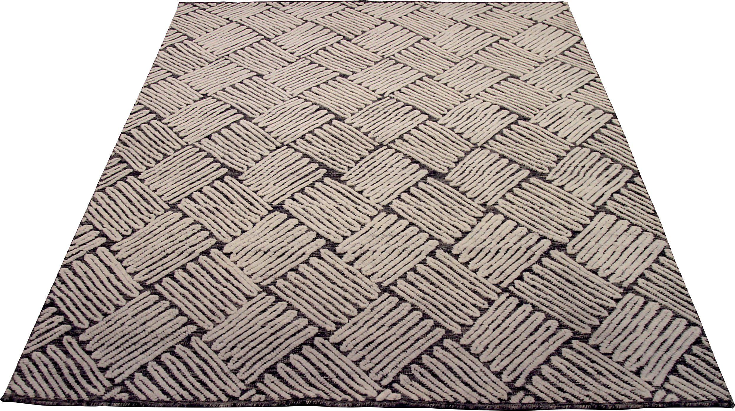 Descubre la elegancia de la Alfombra Pequeña India Lava de Circa 1990. Diseñado con lana y marrón-marfil, este diseño exclusivo es perfecto para realzar tu espacio.