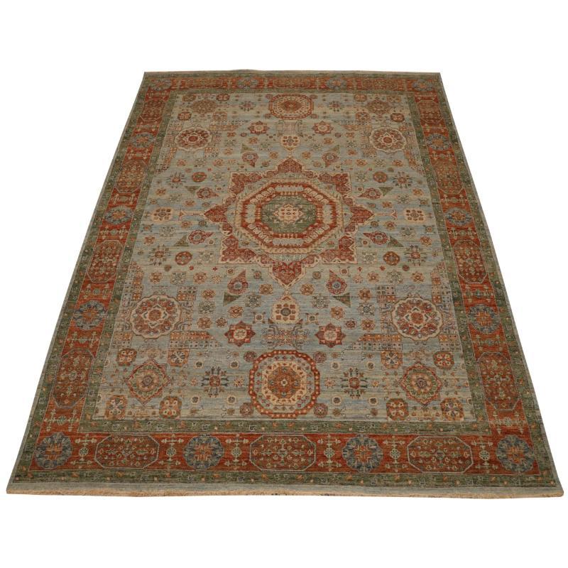 Entdecken Sie die Eleganz der indischen Mamluken mit Teppichen von CIRCA 1990. Dieses exklusive Design aus Wolle und ElfenbeinHellblauRot ist perfekt, um Ihren Raum zu verschönern.