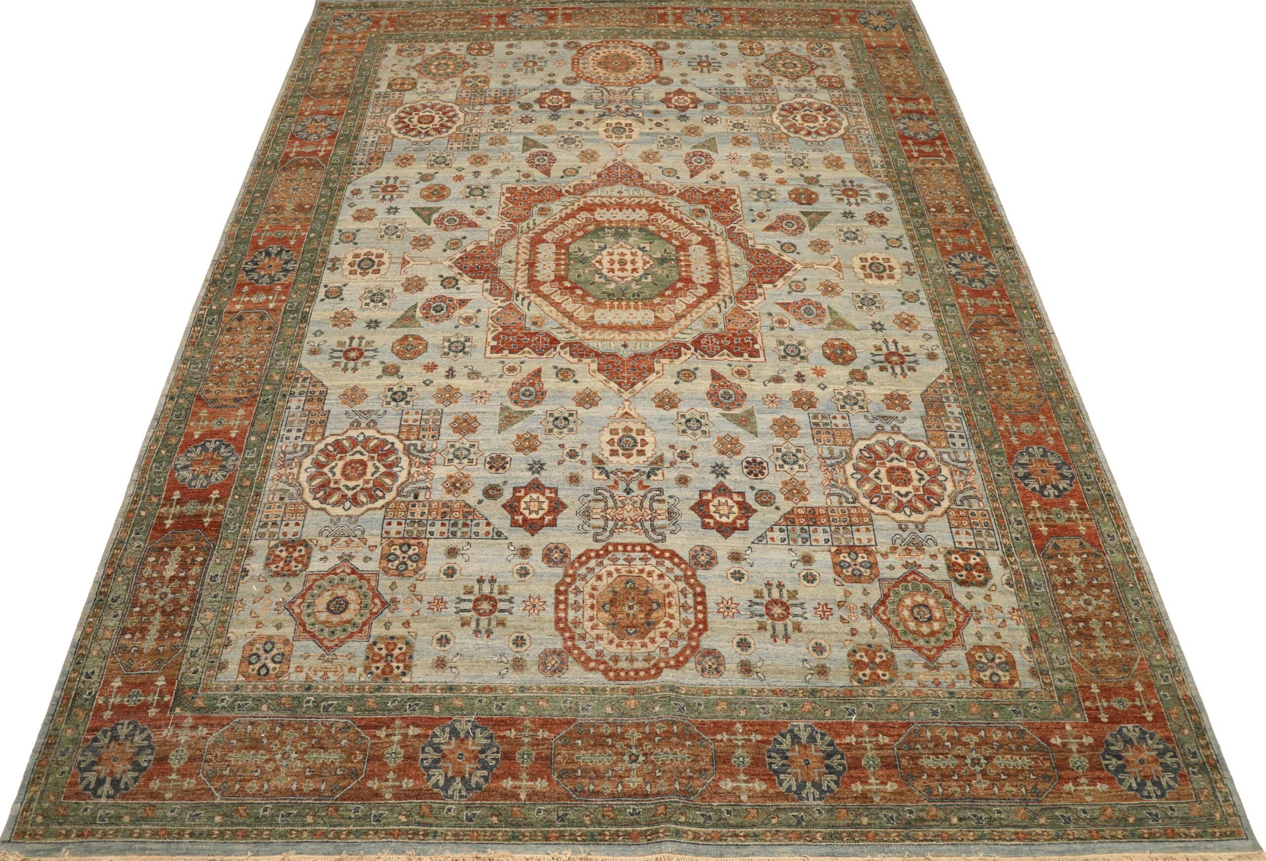 Entdecken Sie die Eleganz der indischen Mamluken mit Teppichen von CIRCA 1990. Dieses exklusive Design aus Wolle und Hellblau-Rot ist perfekt, um Ihren Raum zu verschönern.