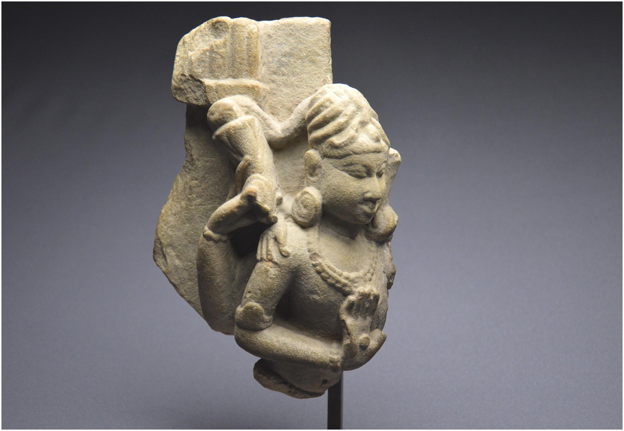Origin: India
Period: 11th century
Material: Sandstone
Dimensions including stand: 18.5 x 32.5 cm
Condition: Visible accidents and losses
Provenance: French collection from the 70s

Fragment of a sandstone stele depicting the Hindu deity