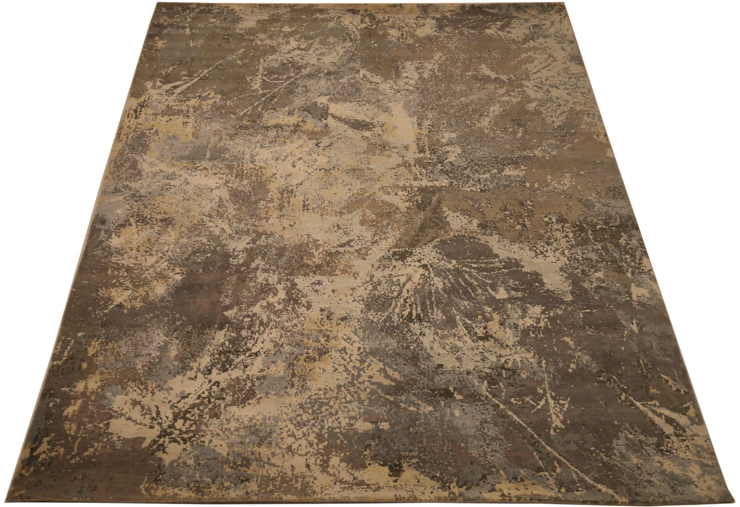 Découvrez l'élégance de l'Inde moderne avec les tapis de zone de Circa 1990. Conçu avec de la laine et du Design/One, ce design exclusif est parfait pour mettre en valeur votre espace.