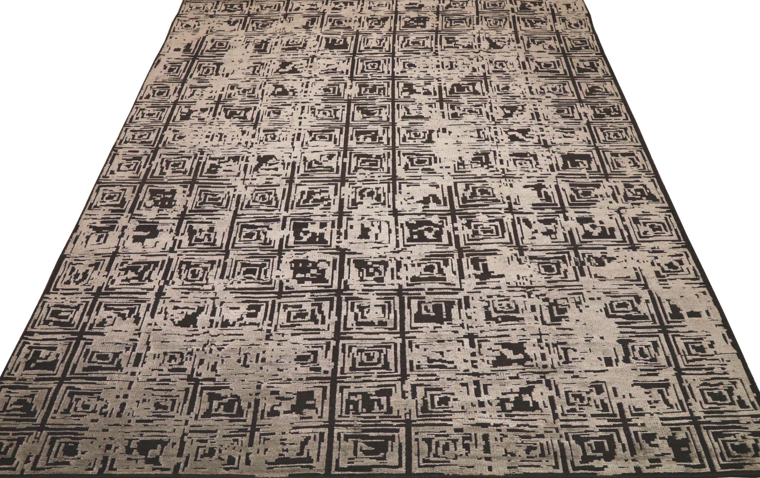 A Modern Indian Wool Area Rug 

This extraordinary rug commands attention with its dynamic visual distortion and captivating abstract energy. Its bold, graphic composition and refined monochromatic palette provide an unparalleled foundation of