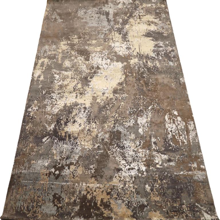 The Abstract Landscape: A Modern Painterly Wool Rug
This magnificent area rug is a stunning work of contemporary art, a piece that transforms the floor into a captivating, abstract landscape. It channels the energy and texture of a master's