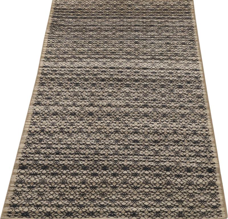 Allow your eyes to dance across the intricate tapestry of this exquisite modern/contemporary wool runner rug, a genuine work of art that effortlessly intertwines captivating design with a sophisticated color palette. Measuring a versatile 2 feet by