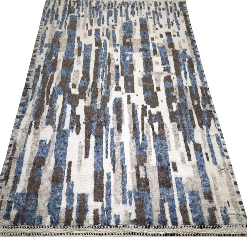 India Moroccan Area Rug,
This magnificent area rug is a powerful piece of abstract art for the floor, a textural landscape of color and form that brings a profound sense of contemporary sophistication to any interior.
 It channels the energy of an
