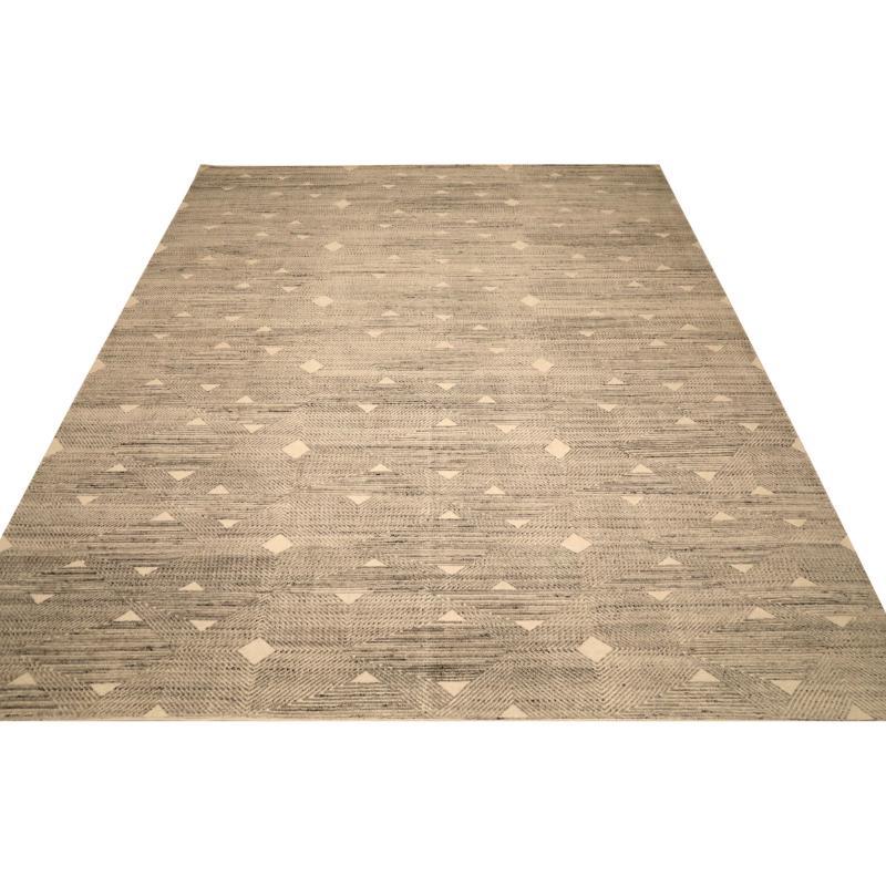 Découvrez l'élégance des tapis de l'Inde marocaine de Circa 1990. Conçu avec de la laine et du Design/One, ce design exclusif est parfait pour mettre en valeur votre espace.