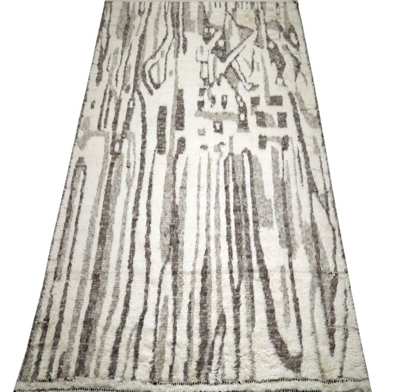 Découvrez l'élégance des tapis de l'Inde marocaine de Circa 1990. Conçu avec de la laine et du Design/One, ce design exclusif est parfait pour mettre en valeur votre espace.