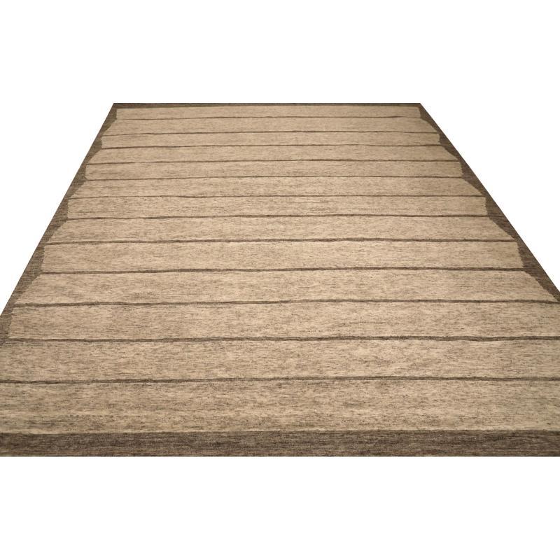 Indian Area Rug: Muted Moroccan Abstract

A Vision of Modern Artistry
This exceptional Indian wool rug, measuring 12 ft 3 in x 14 ft 11 in, stands as a stunning testament to the enduring artistry of global textile traditions. Its plush surface