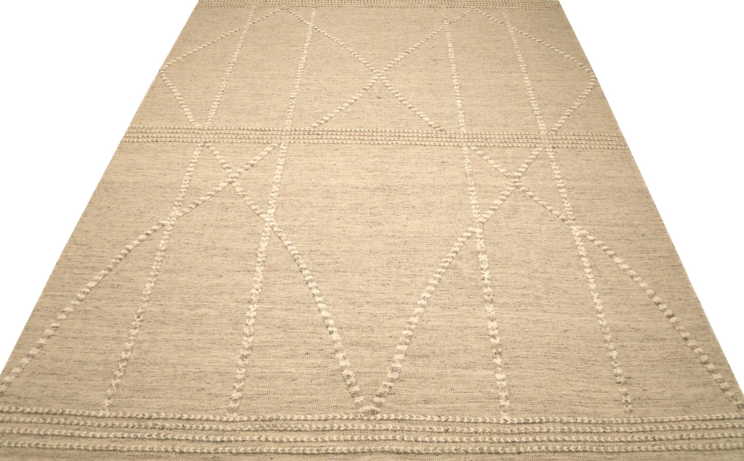 Entdecken Sie die Eleganz der indisch-marokkanischen Teppiche von Circa 1990. Dieses exklusive Design aus Wolle und Elfenbein ist perfekt, um Ihren Raum zu verschönern.
