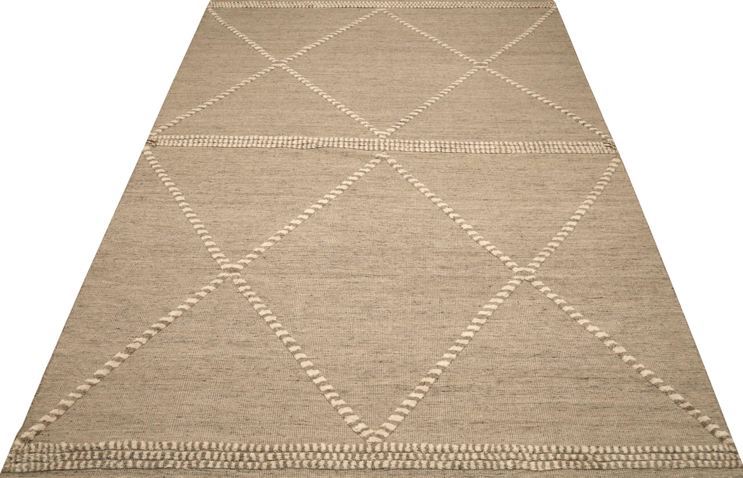 Modern Geometric Wool Area Rug

This extraordinary rug manifests precise geometric clarity and intricate textural artistry. Its refined tonal palette and structured all-over patterns create an unyielding foundation of elegant calm and compelling