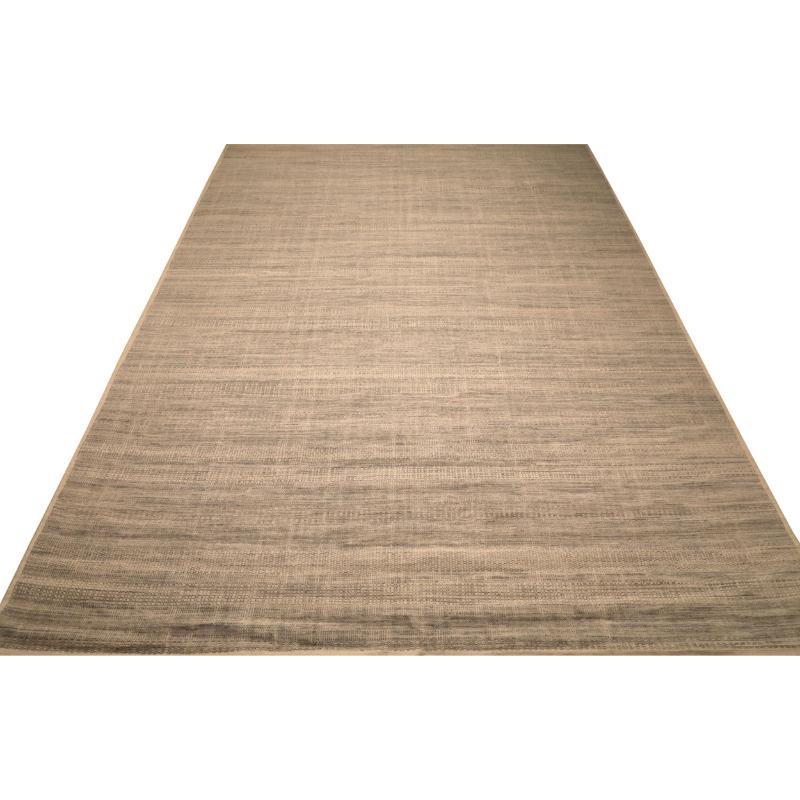 Scopri l'eleganza dell'India Moroccan caratterizzato da un tappeto over size del 1990. Progettato con lana e IvoryTaupe, questo design esclusivo è perfetto per valorizzare il tuo spazio.