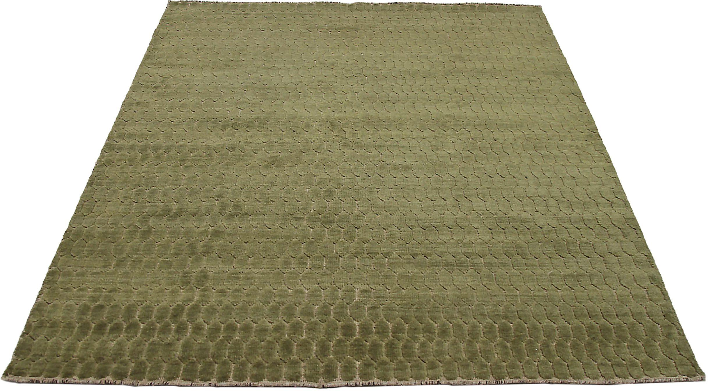 Découvrez l'élégance de l'Eleg de l'Inde présentant un petit tapis de Circa 1990. Conçu avec de la laine et du vert, ce design exclusif est parfait pour mettre en valeur votre espace.