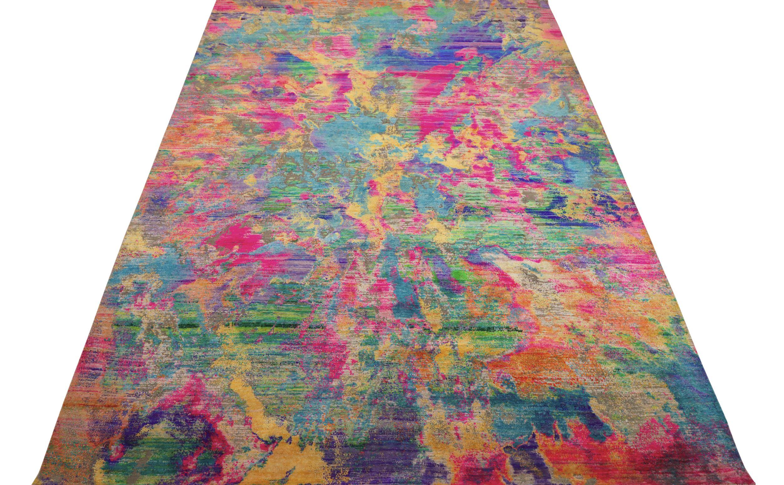 Découvrez l'élégance des tapis en soie Sari de l'Inde, datant de 1990. Conçu avec de la laine et du bleu-vert-rose-jaune, ce design exclusif est parfait pour mettre en valeur votre espace.