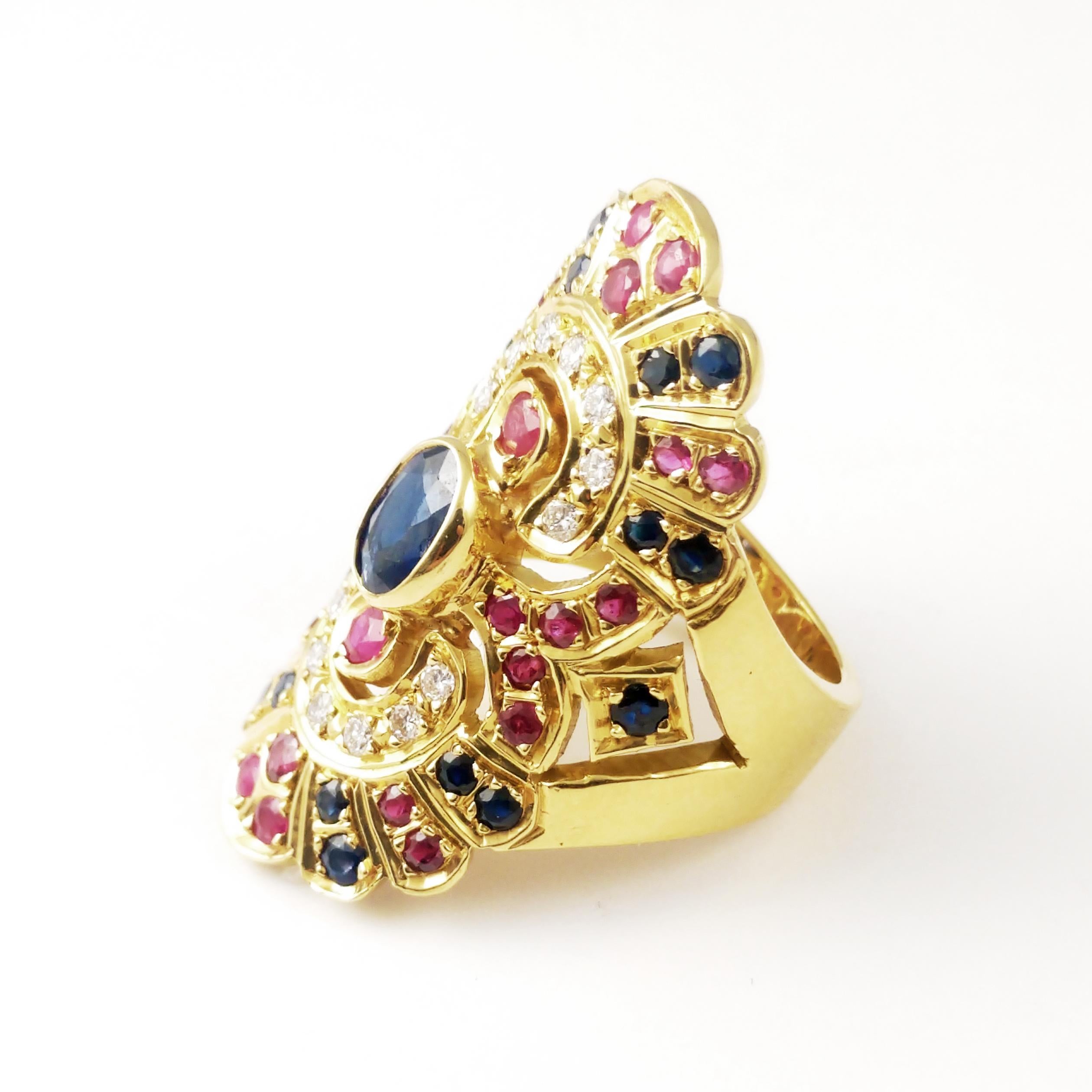 This ethnic and trendy ring features oval blue sapphire surrounded by blue sapphire rubies and diamonds. This ring is great for Anniversary, Engagement, Party, or Wedding gift. The finger size is currently a 7 but can be adjusted to fit any finger.