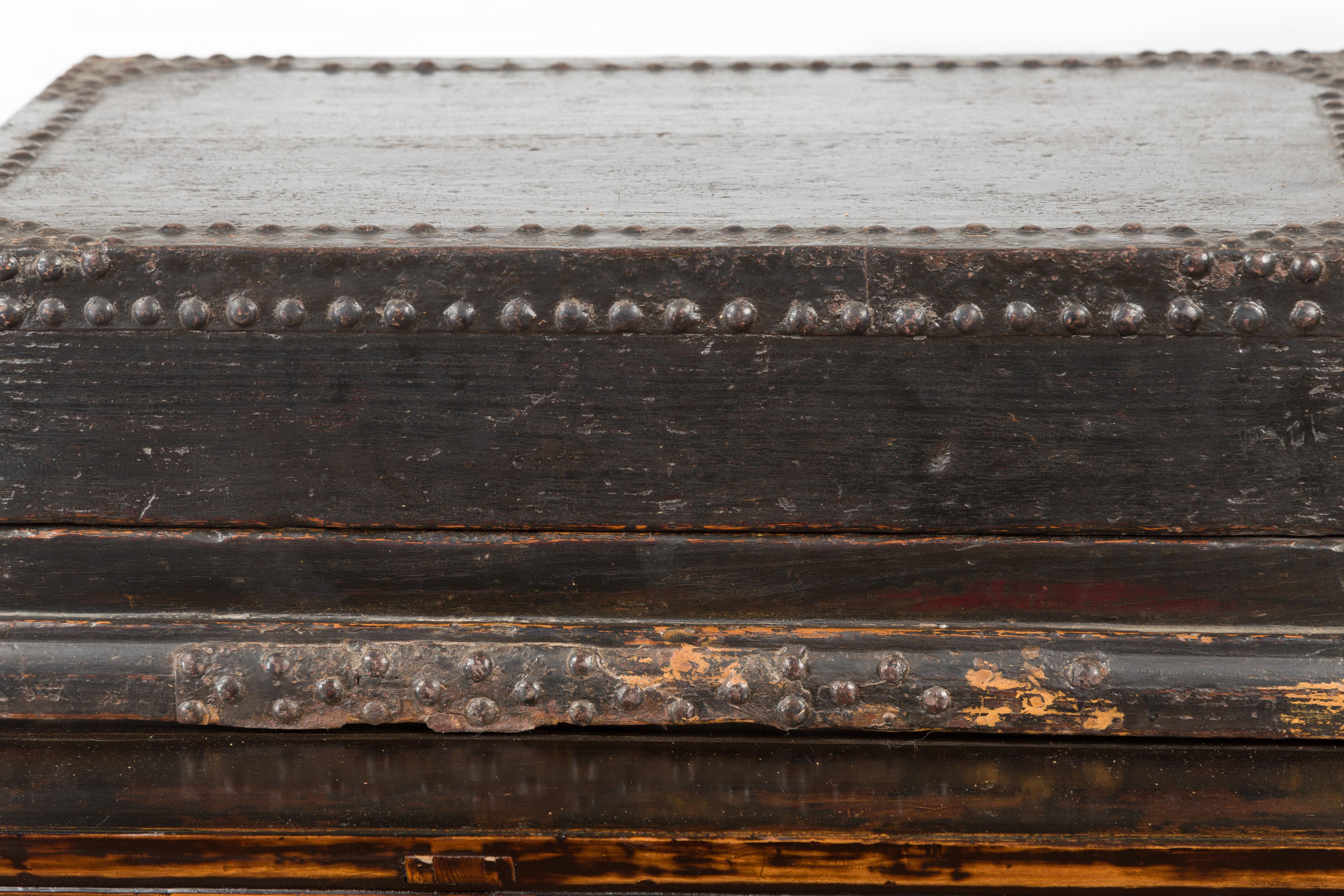 Indian 19th Century Black Box with Iron Nailheads, Braces and Rustic Patina For Sale 3