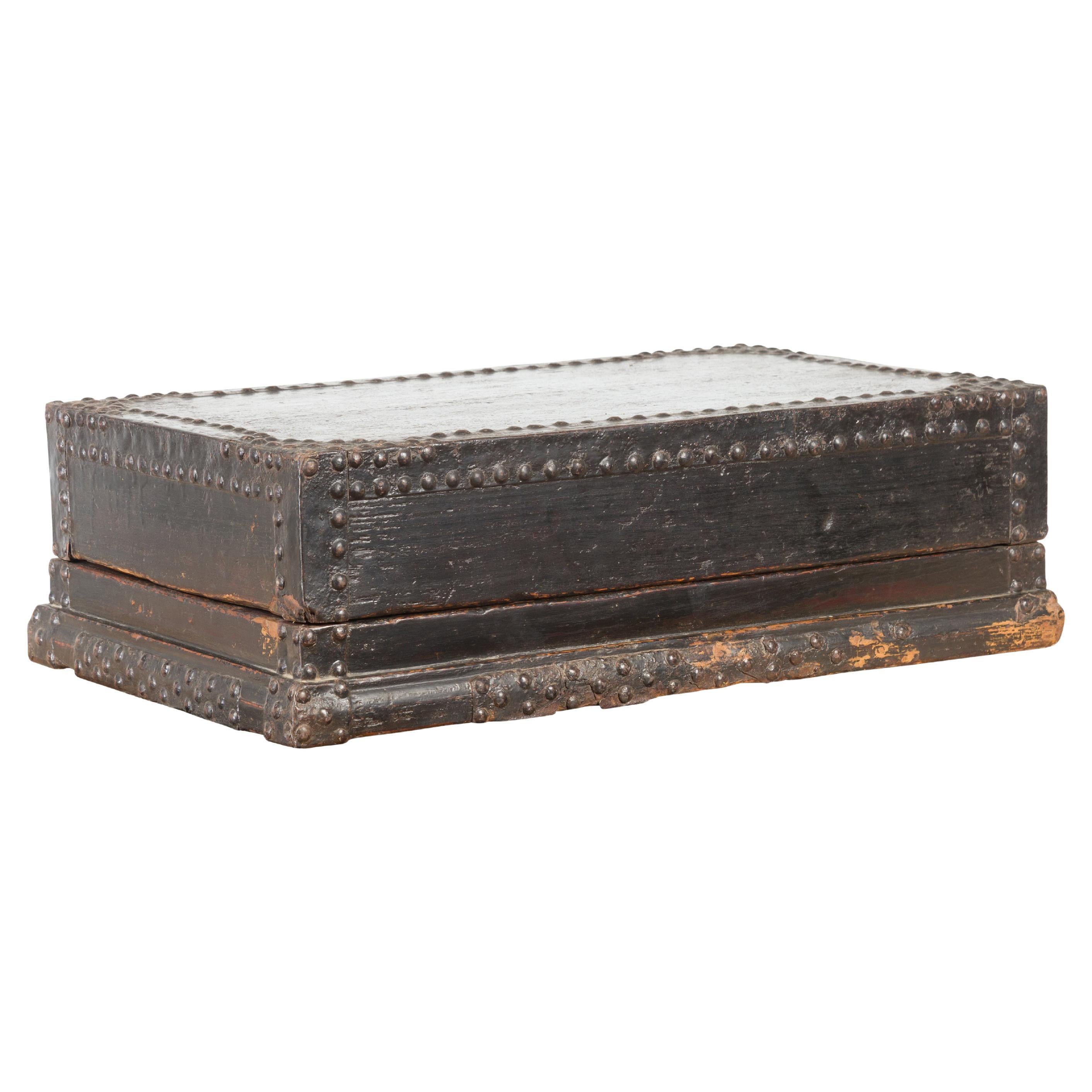 Indian 19th Century Black Box with Iron Nailheads, Braces and Rustic Patina For Sale