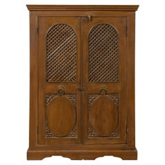 Used Indian 19th Century Cabinet with Metal Fretwork Motifs and Oval Medallions