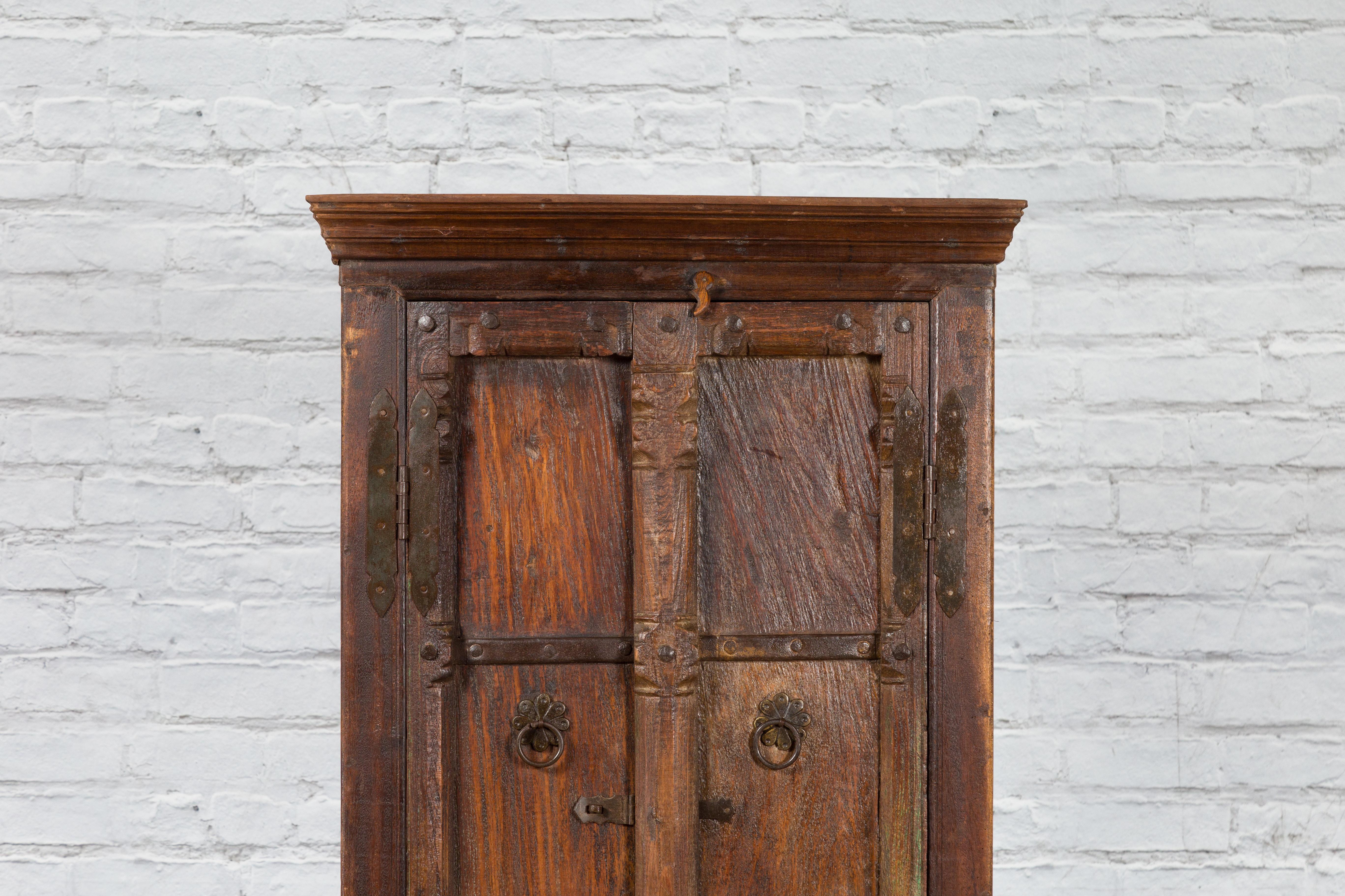 Hand-Carved Indian 19th Century Gujarat Armoire with Iron Braces and Carved Half Columns For Sale