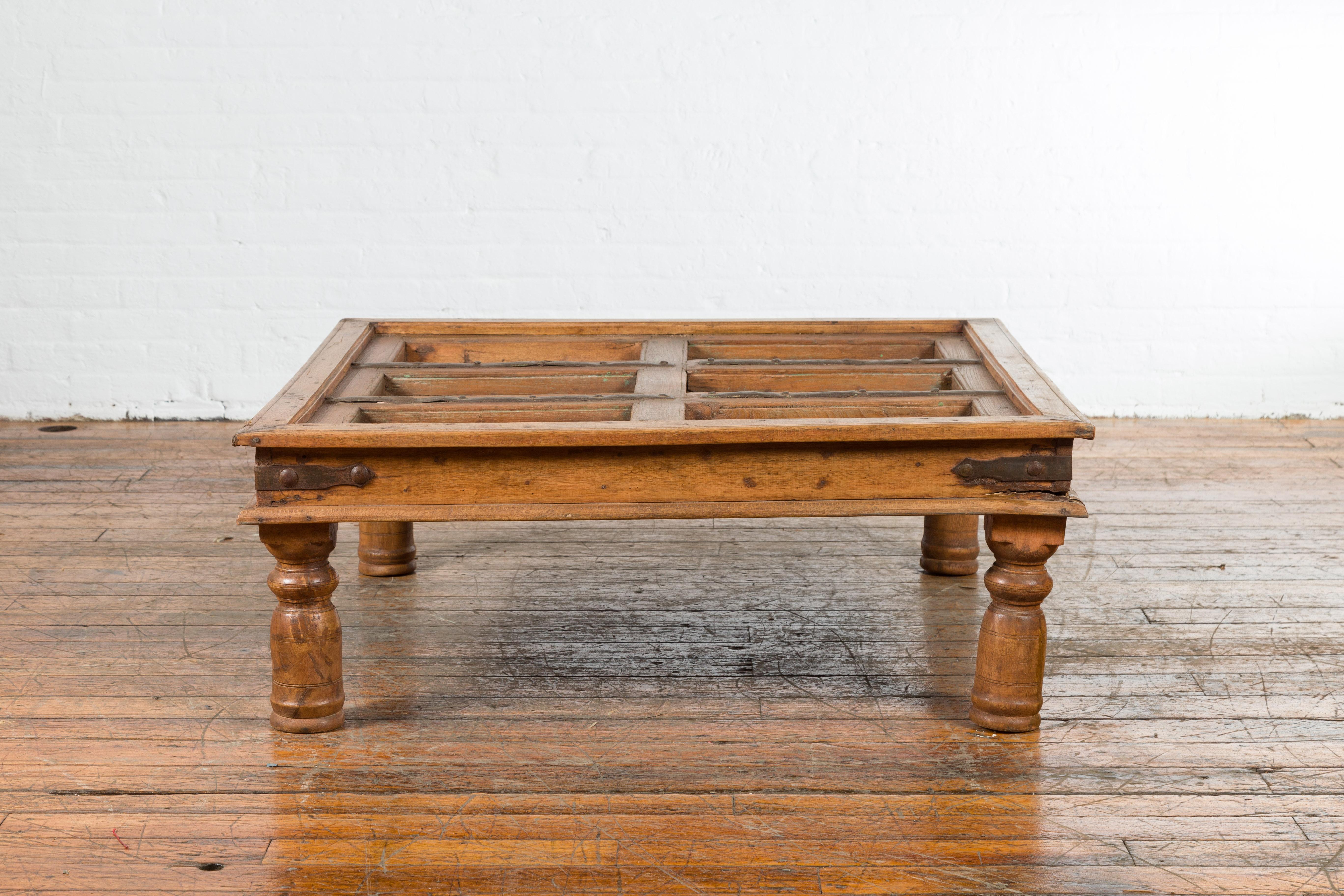 19th Century Indian Paneled Door with Iron Accents Converted into a Coffee Table For Sale 6