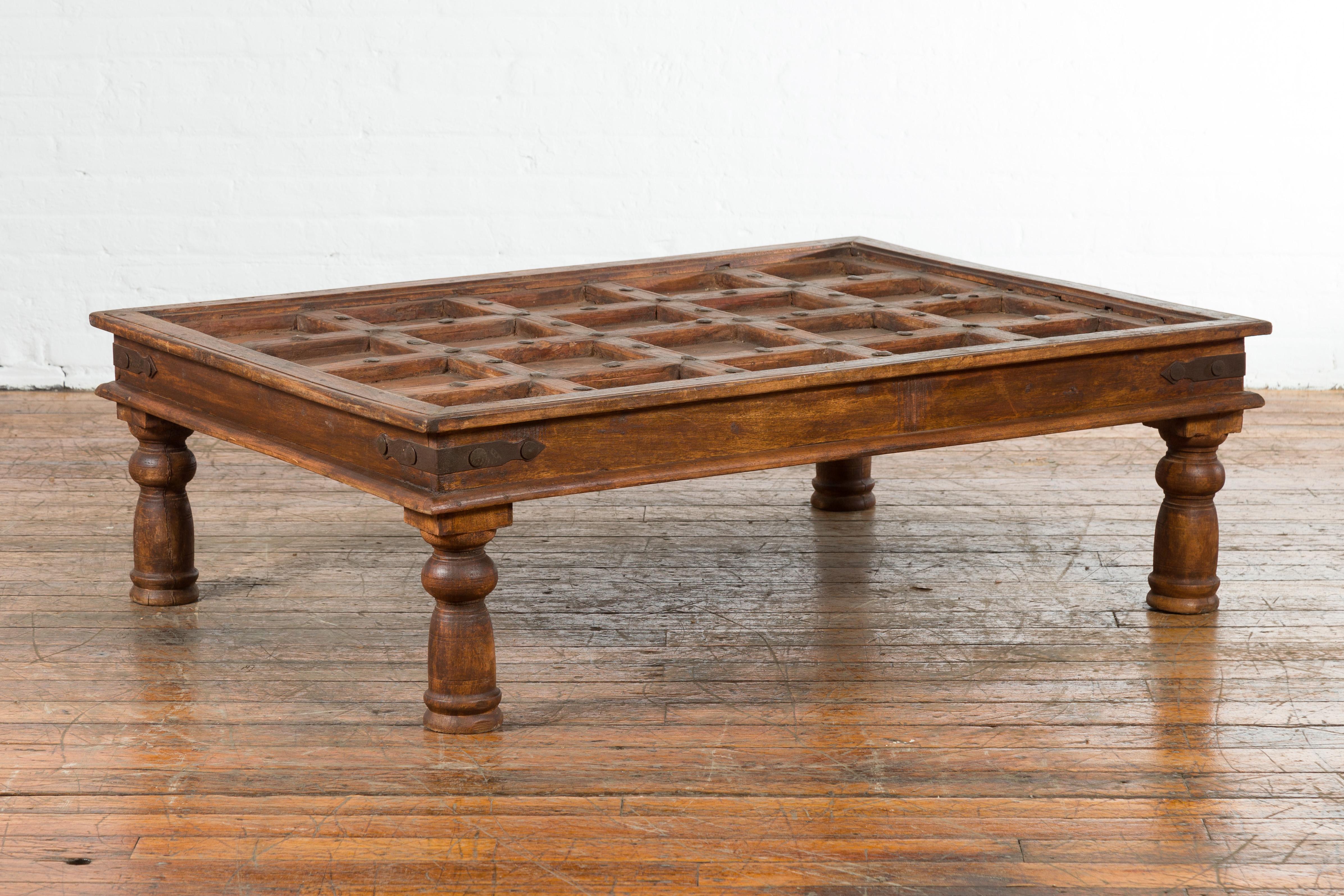 Indian 19th Century Paneled Door with Iron Accents Turned into a Coffee Table In Good Condition In Yonkers, NY