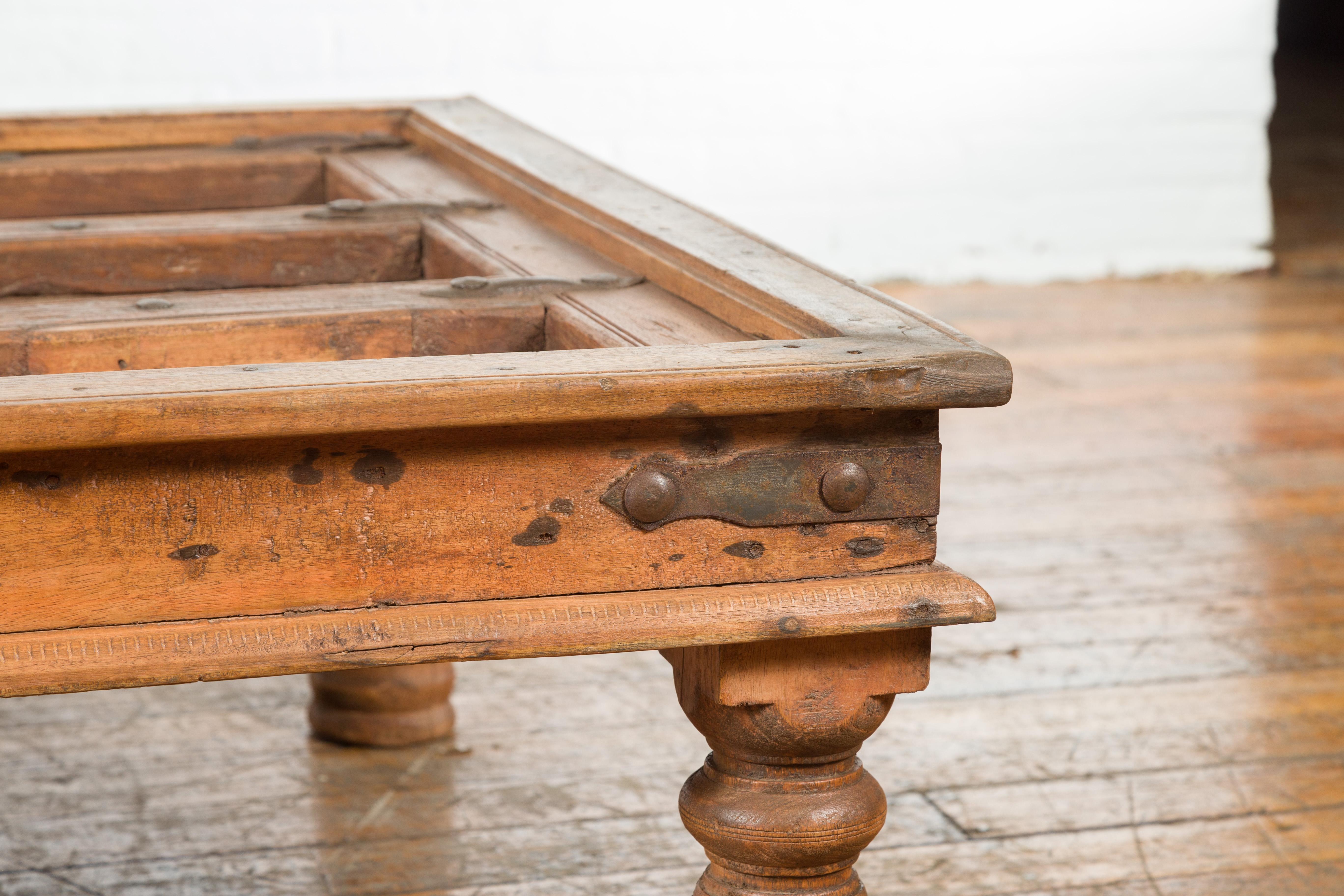 Rustic Indian 19th Century Sheesham Wood Courtyard Door Redesigned as a Coffee Table For Sale