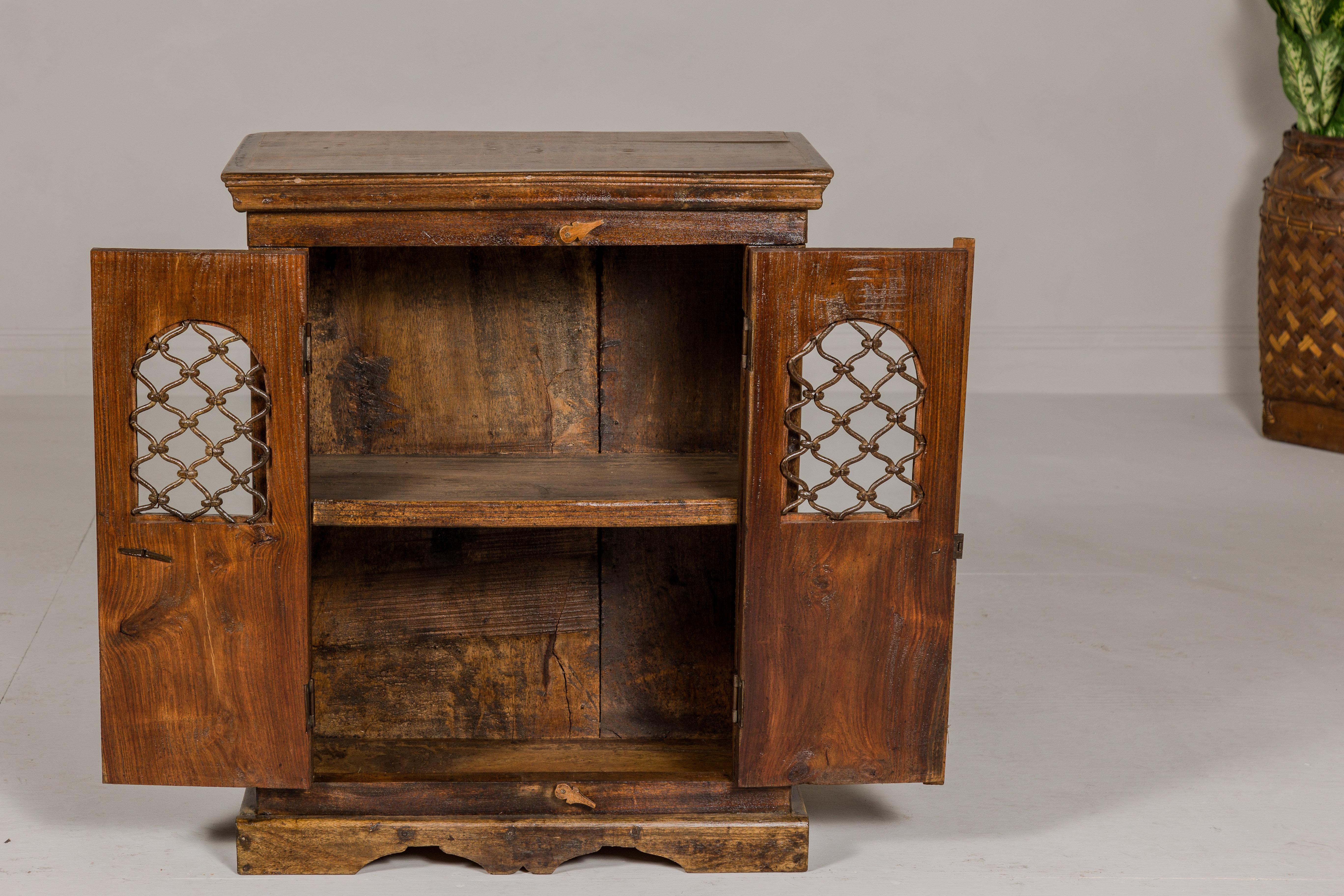 Indian 19th Century Wooden Side Cabinet with Arched Metal Grate Window Door For Sale 9