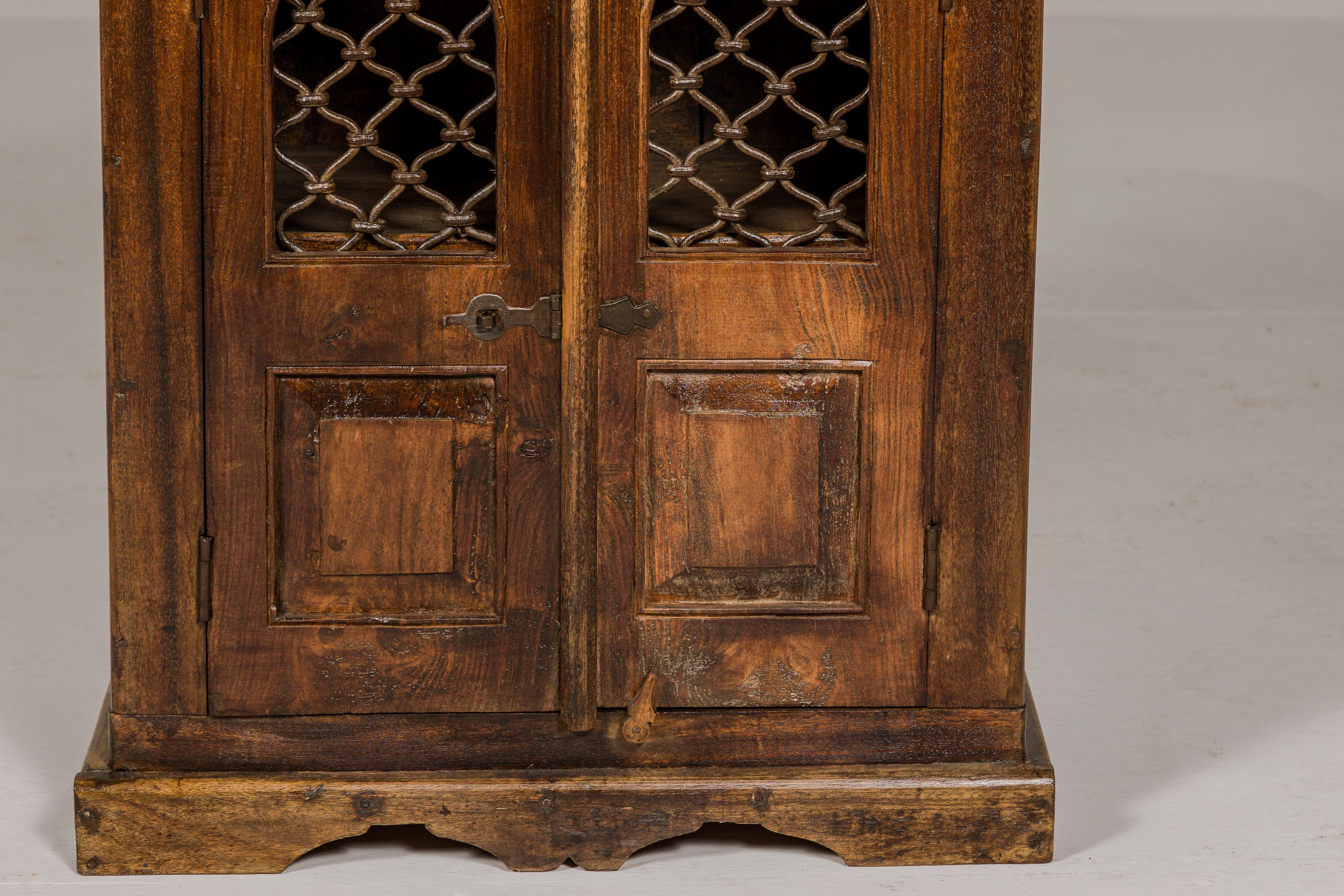 Indian 19th Century Wooden Side Cabinet with Arched Metal Grate Window Door For Sale 2