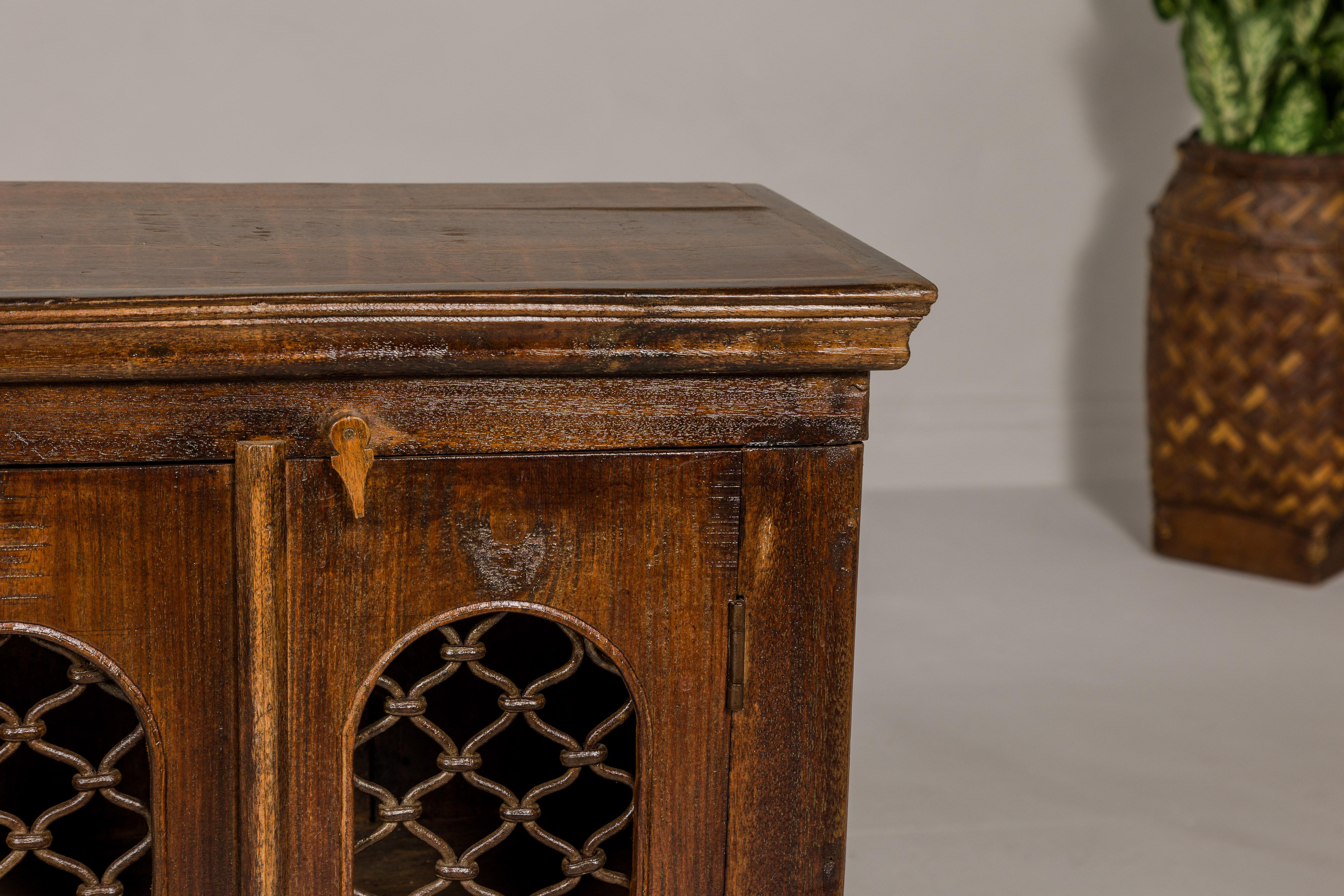 Indian 19th Century Wooden Side Cabinet with Arched Metal Grate Window Door For Sale 6