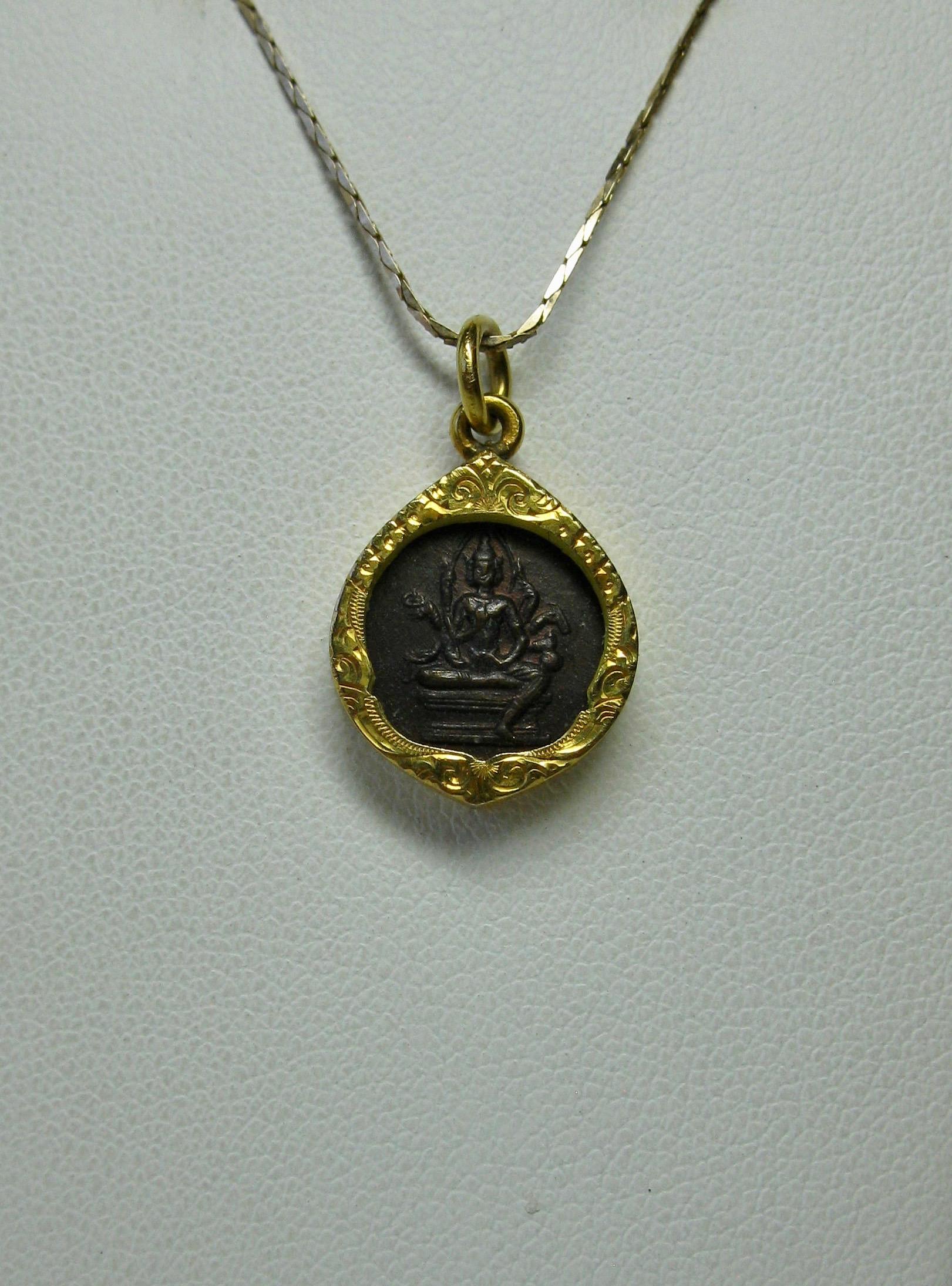 gold durga pendant