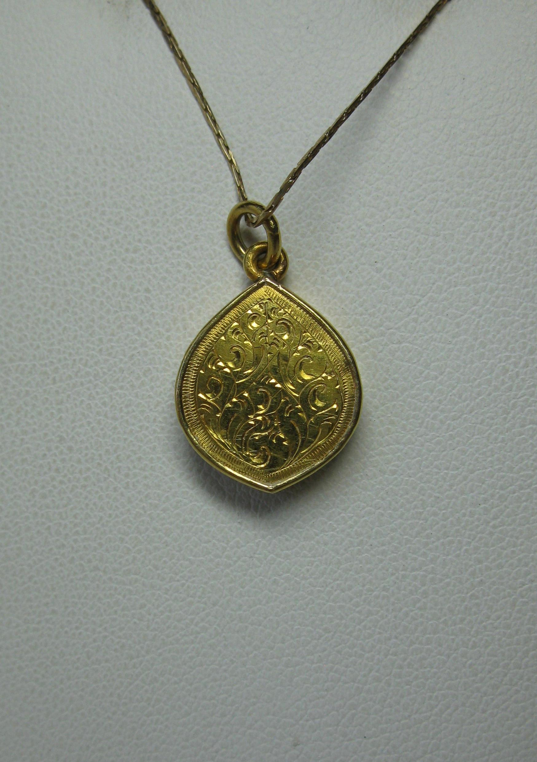 durga gold pendant