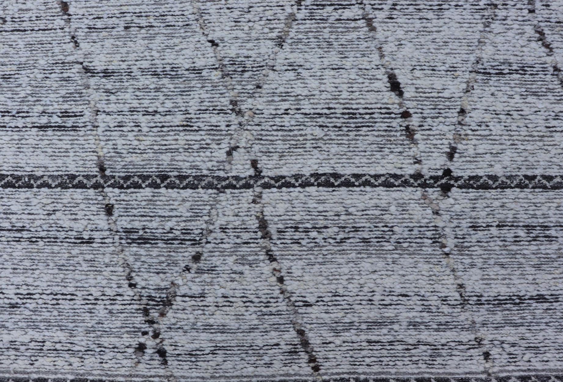 white rug with black diamonds