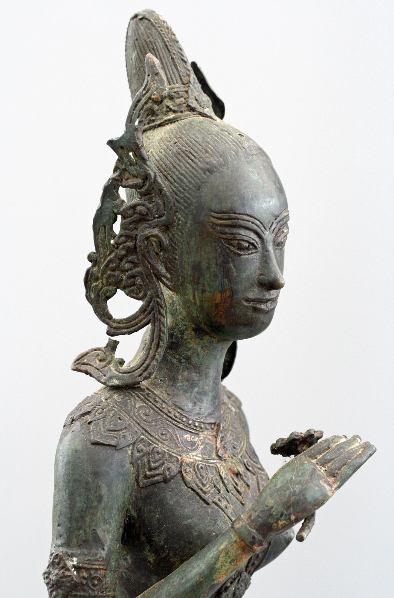 Indonesian Antique Bronze Figure of a Slender Goddess with Lotus Flower 6