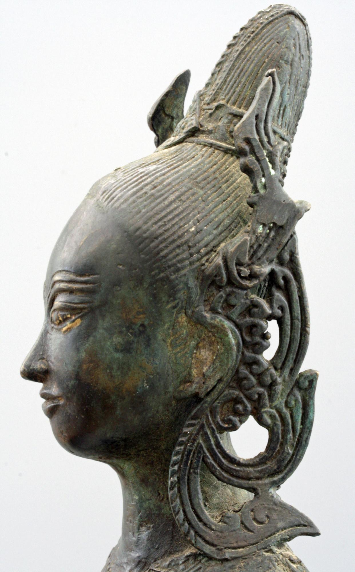 Indonesian Antique Bronze Figure of a Slender Goddess with Lotus Flower In Good Condition In Bishop's Stortford, Hertfordshire