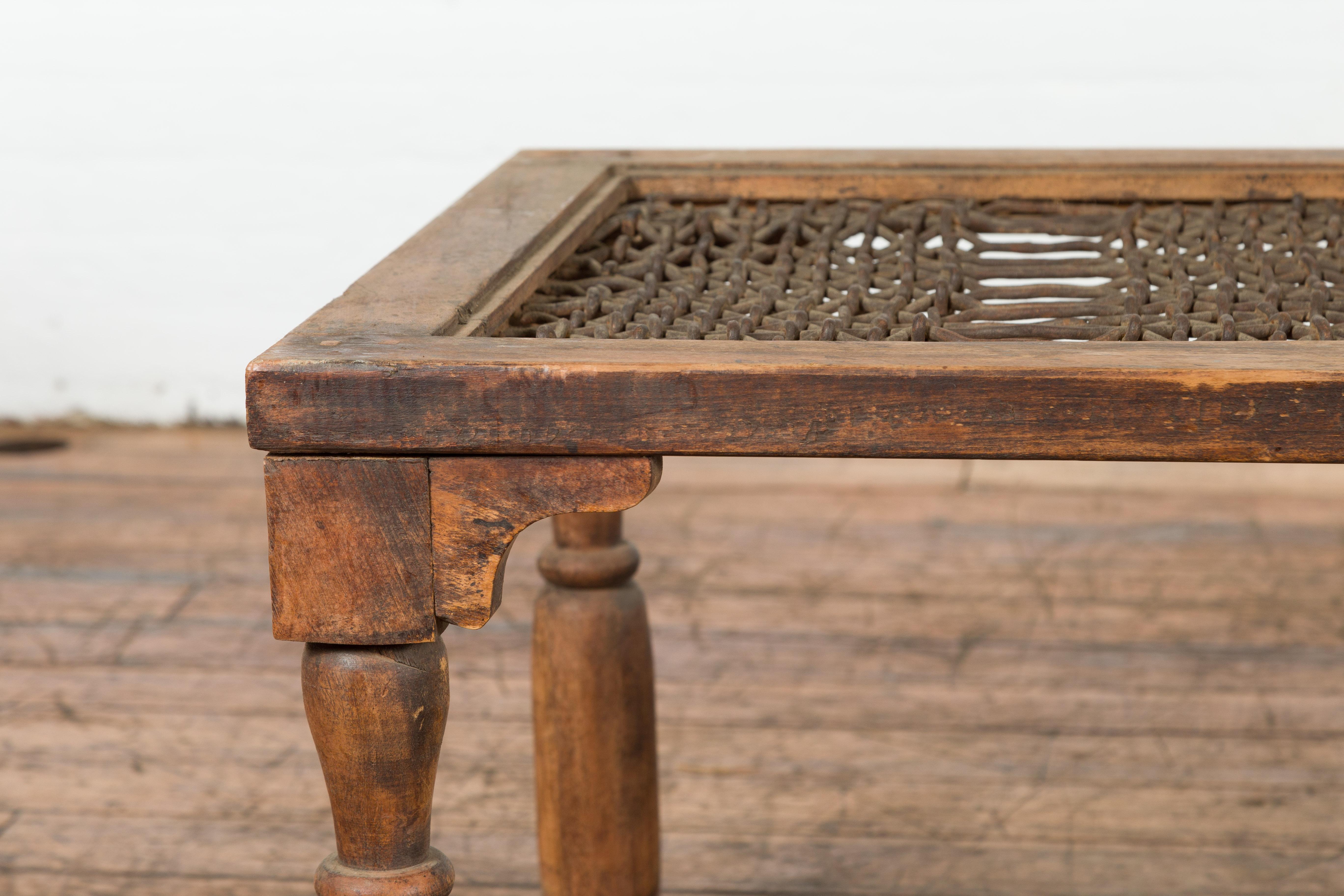 Rustic Indian Antique Window Grate Made into a Coffee Table with Turned Baluster Legs For Sale
