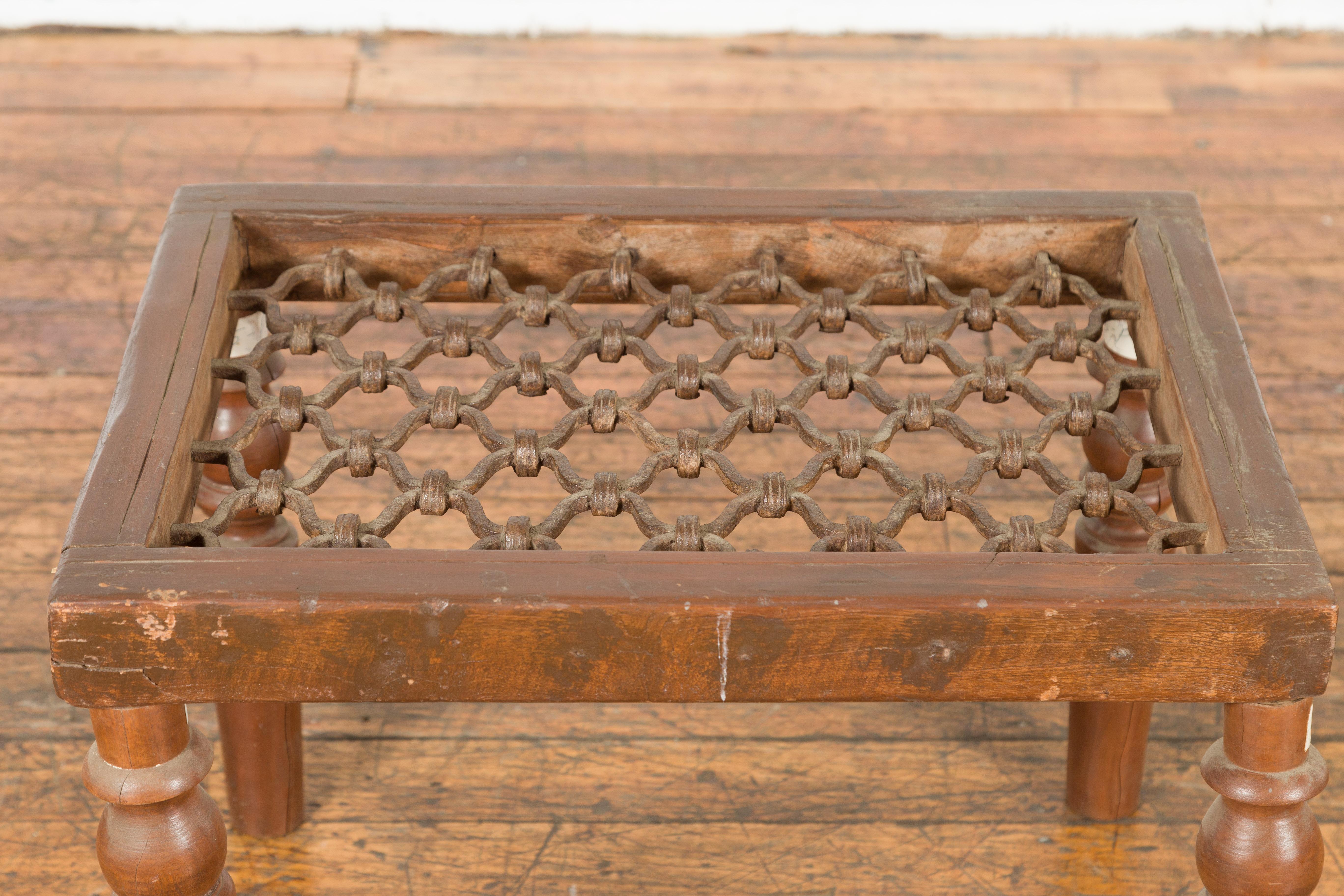 Iron Indian Antique Window Grate Made into a Coffee Table with Turned Baluster Legs For Sale