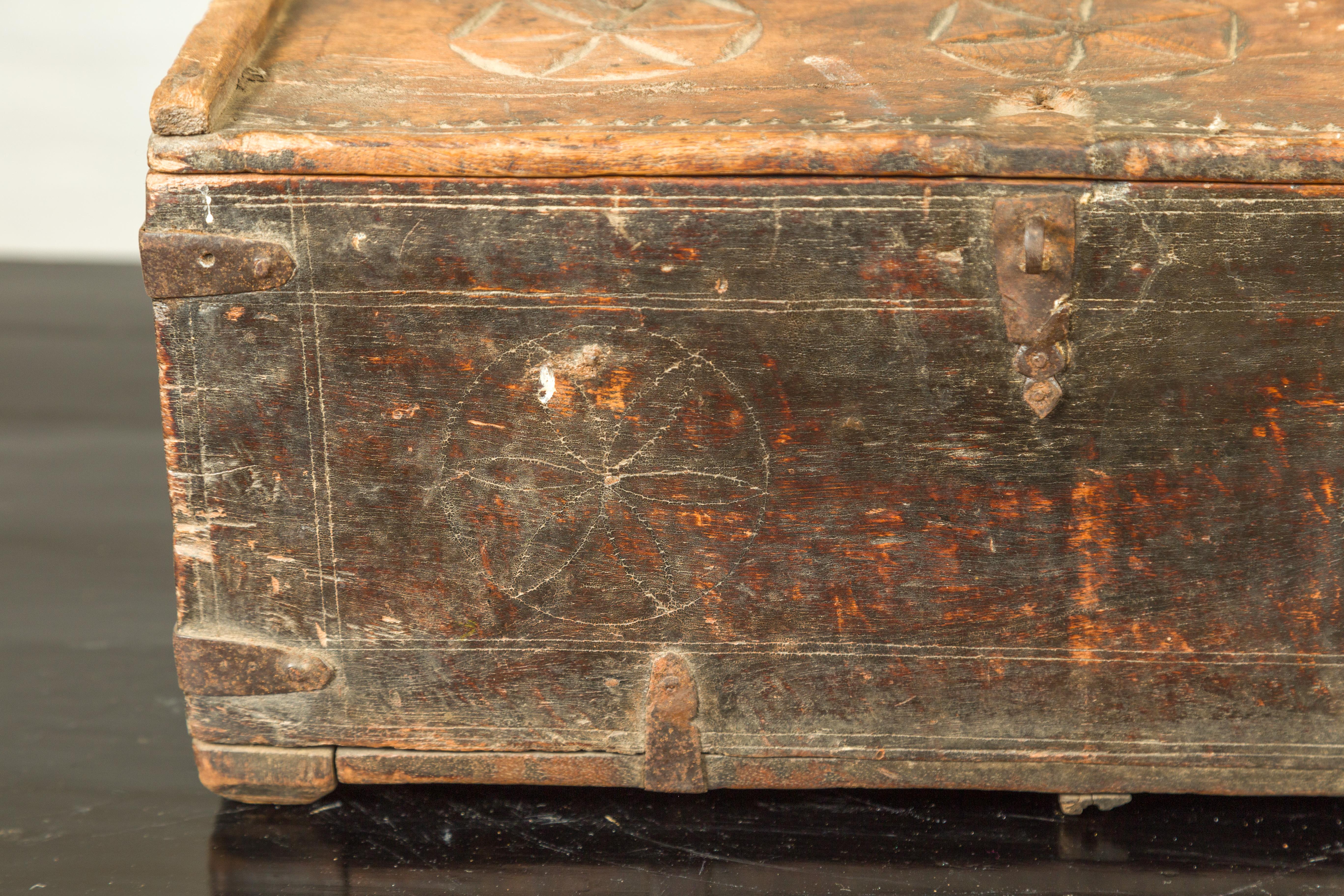 Indian Antique Wooden Dowry Box with Geometric Motifs and Weathered Patina In Fair Condition For Sale In Yonkers, NY