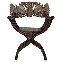 Anglo Indian rosewood and bone Savonarola armchair, India, 1890s