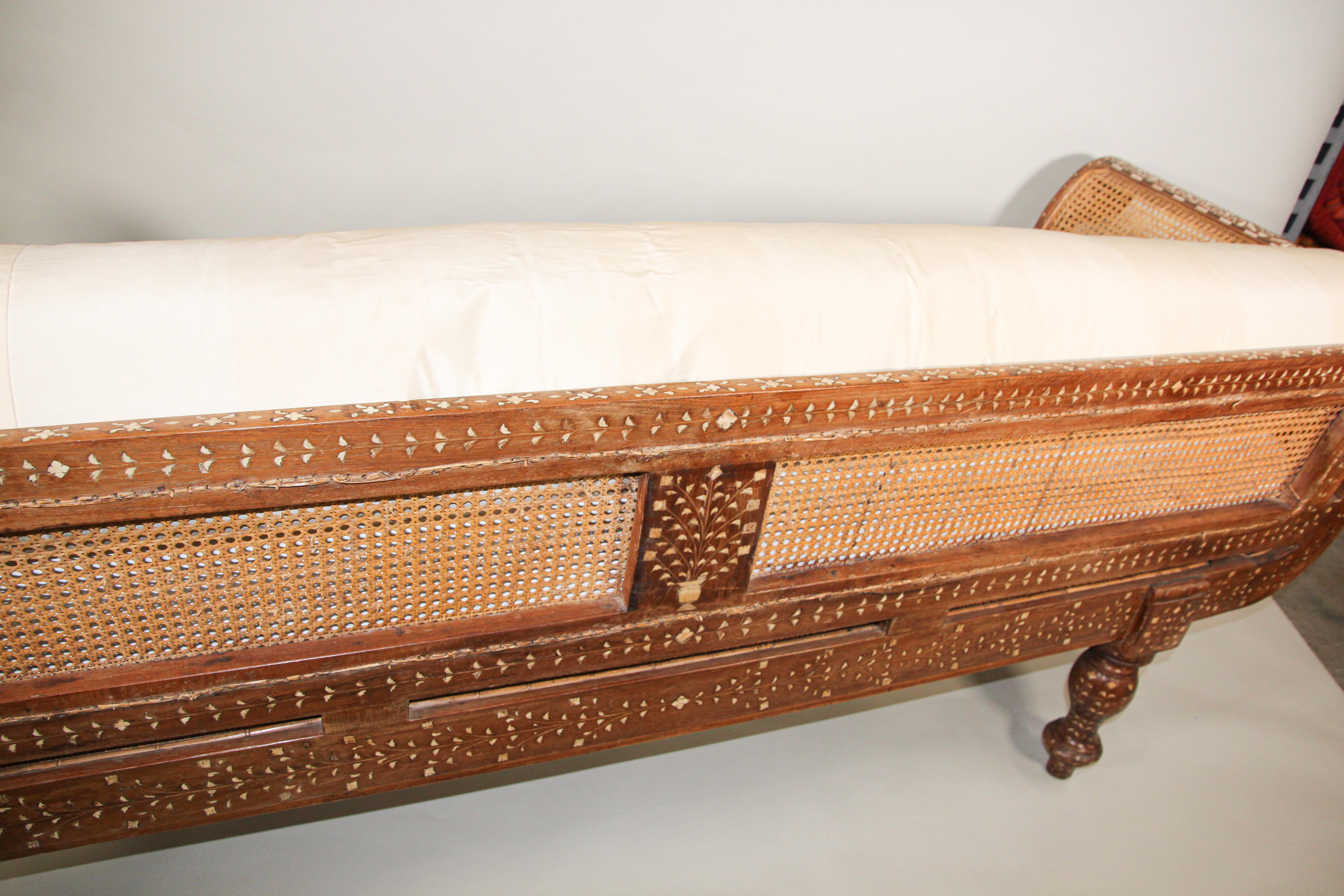 Large antique hand carved Anglo Indian sofa, day bed, heavily inlaid with bone.
The Anglo Indian colonial sofa is inlaid with bone and ebony inlays throughout.
Anglo-Indian settee bench handcrafted from hardwood, and wonderfully hand carved and