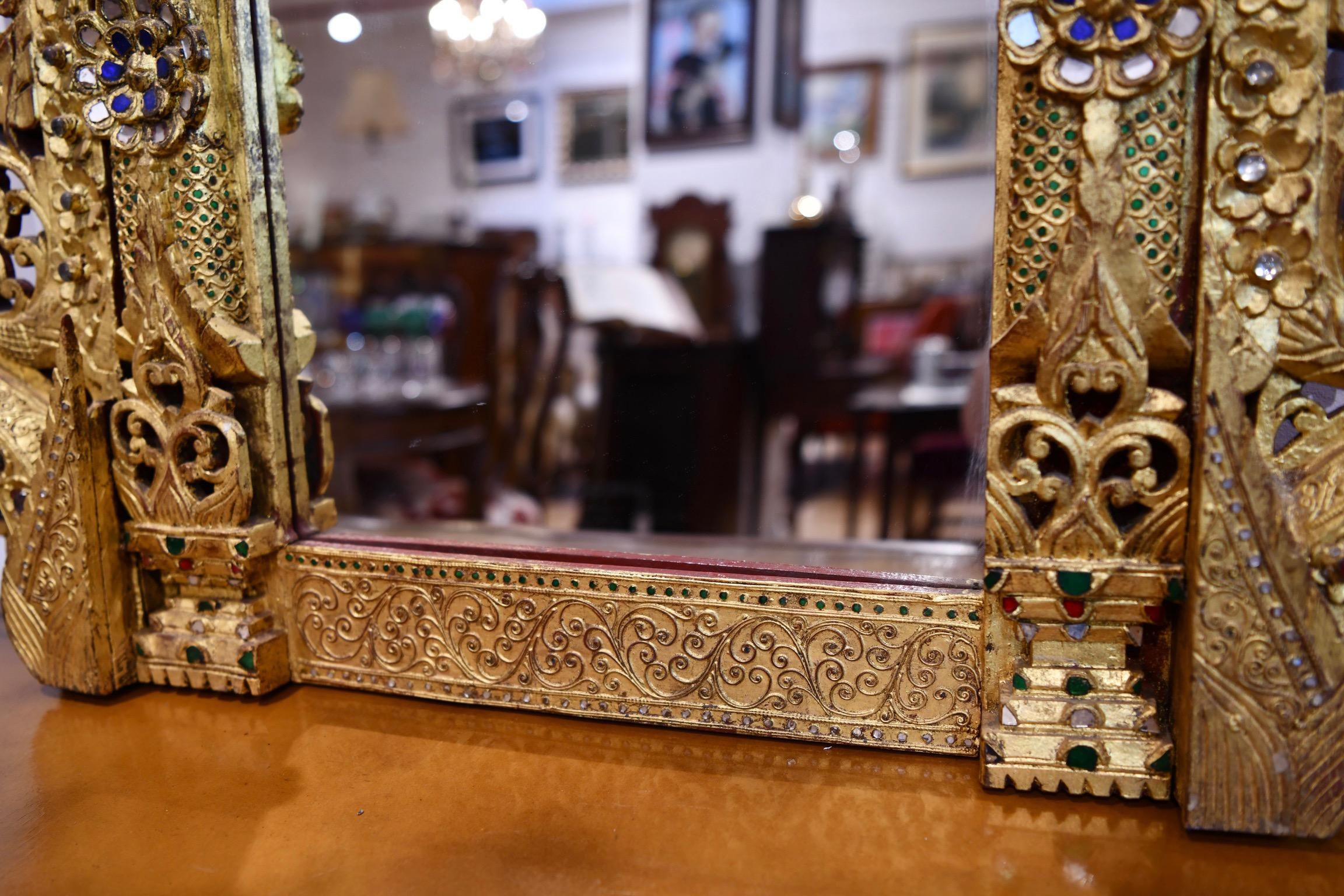 Southeast Asian Carved Giltwood Mirror In Good Condition For Sale In Brooklyn, NY