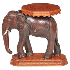 Mesa de elefante de madera dura tallada en la India