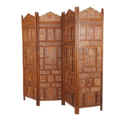 Indian carved & pierced teak folding screen, c. 1900-25