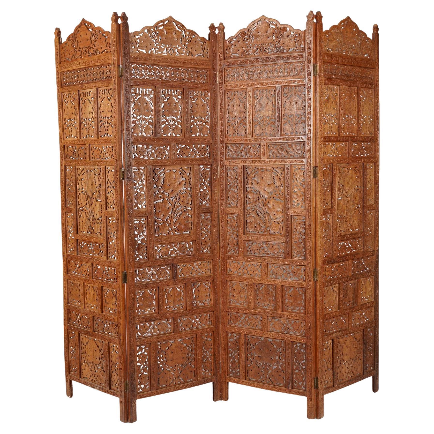 Indian carved & pierced teak folding screen, c. 1900-25