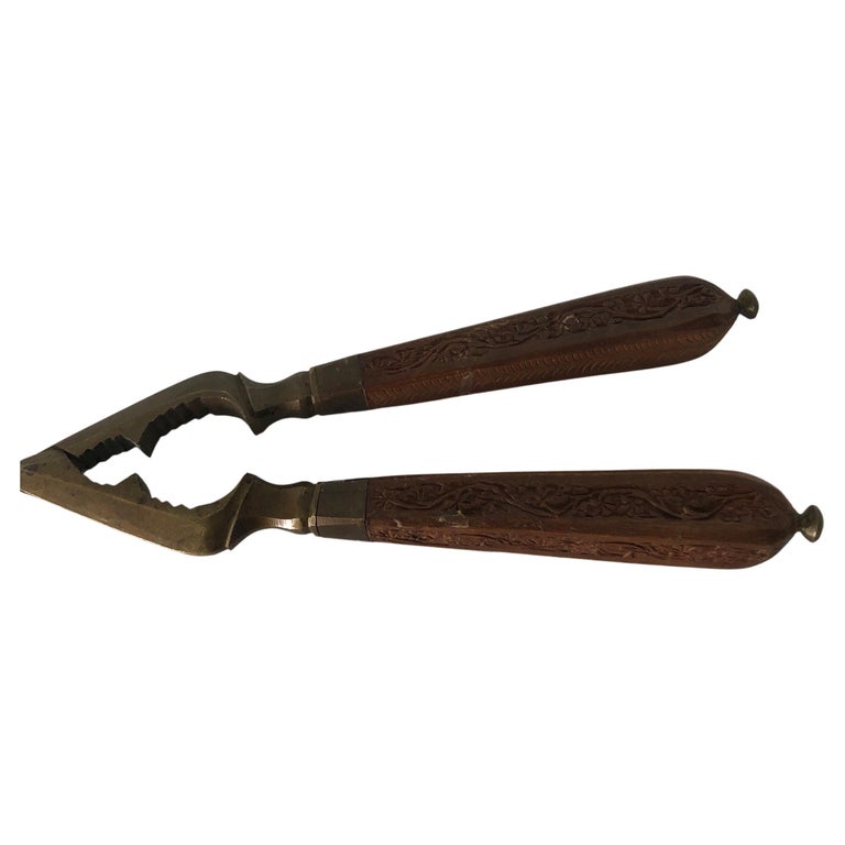 Indian Carved Wood and Brass Vintage Nutcracker For Sale at 1stDibs