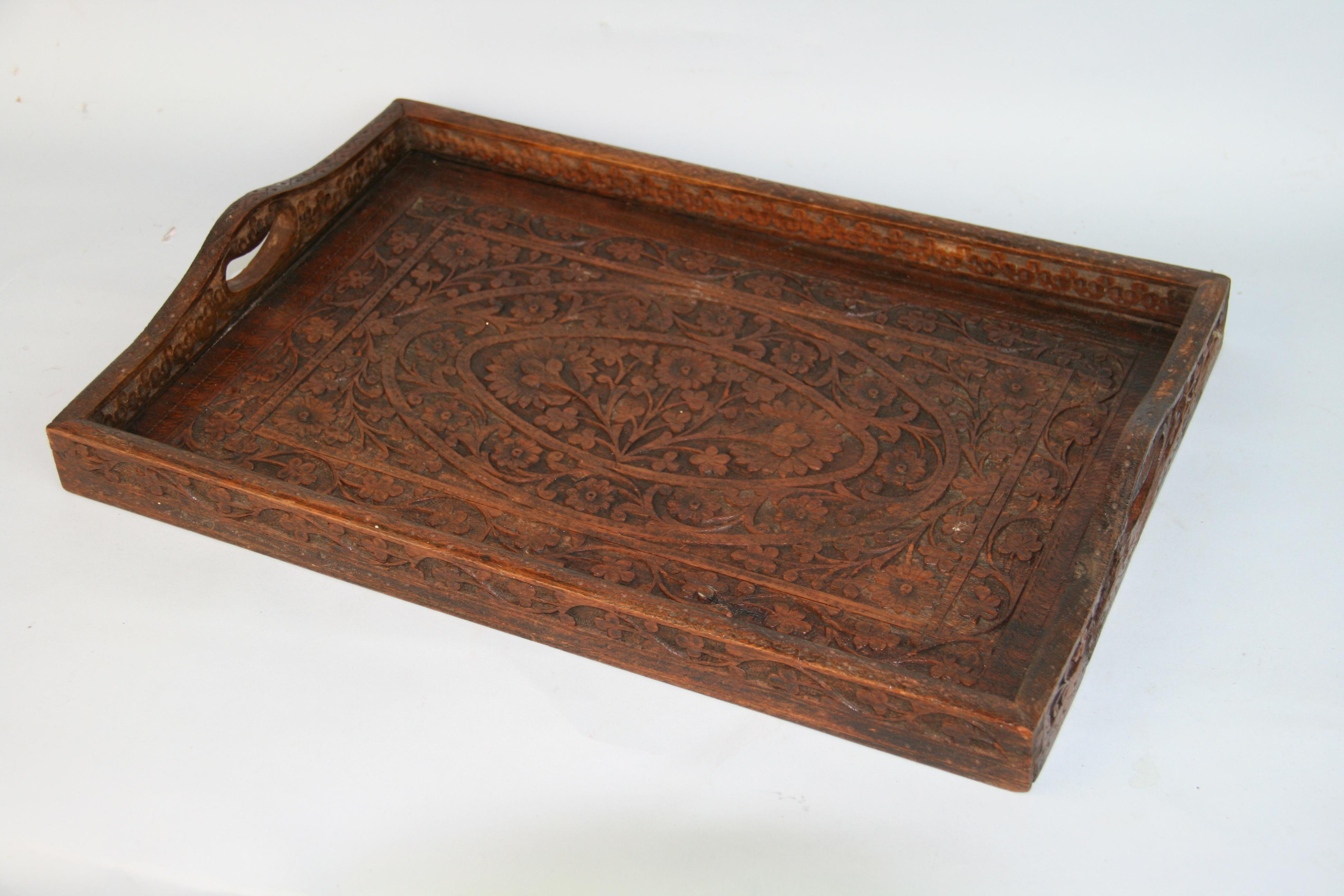 1343 Indian hand carved hardwood serving tray with floral design.