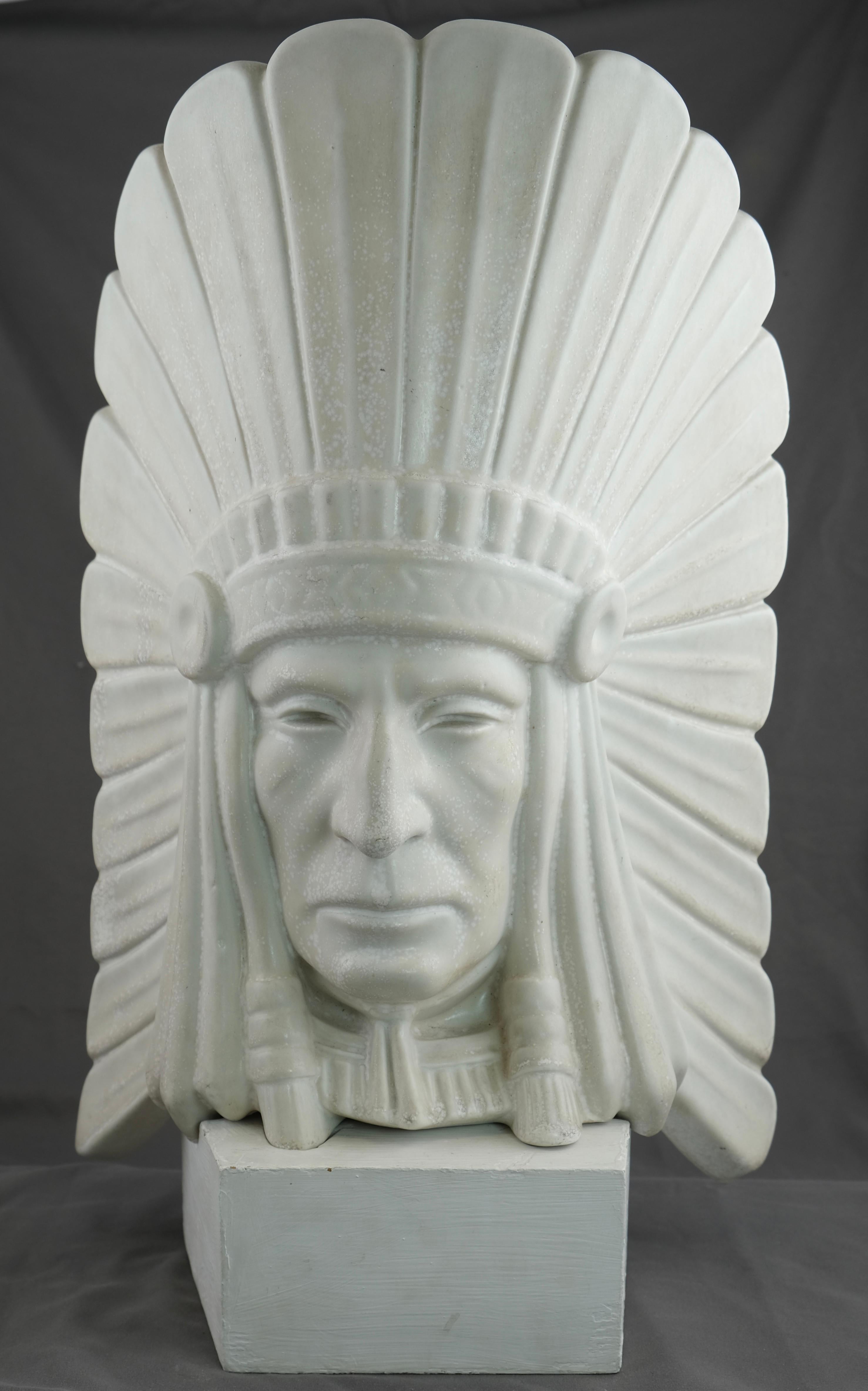 A sculptured head of an American Indian Chief. It is said that this really is a self-portrait of Gunnar Nylund, the artist.
 It has its original wooden stand . The height is 42 cm without the stand and 46.5 cm with the stand. 
The sculpture is