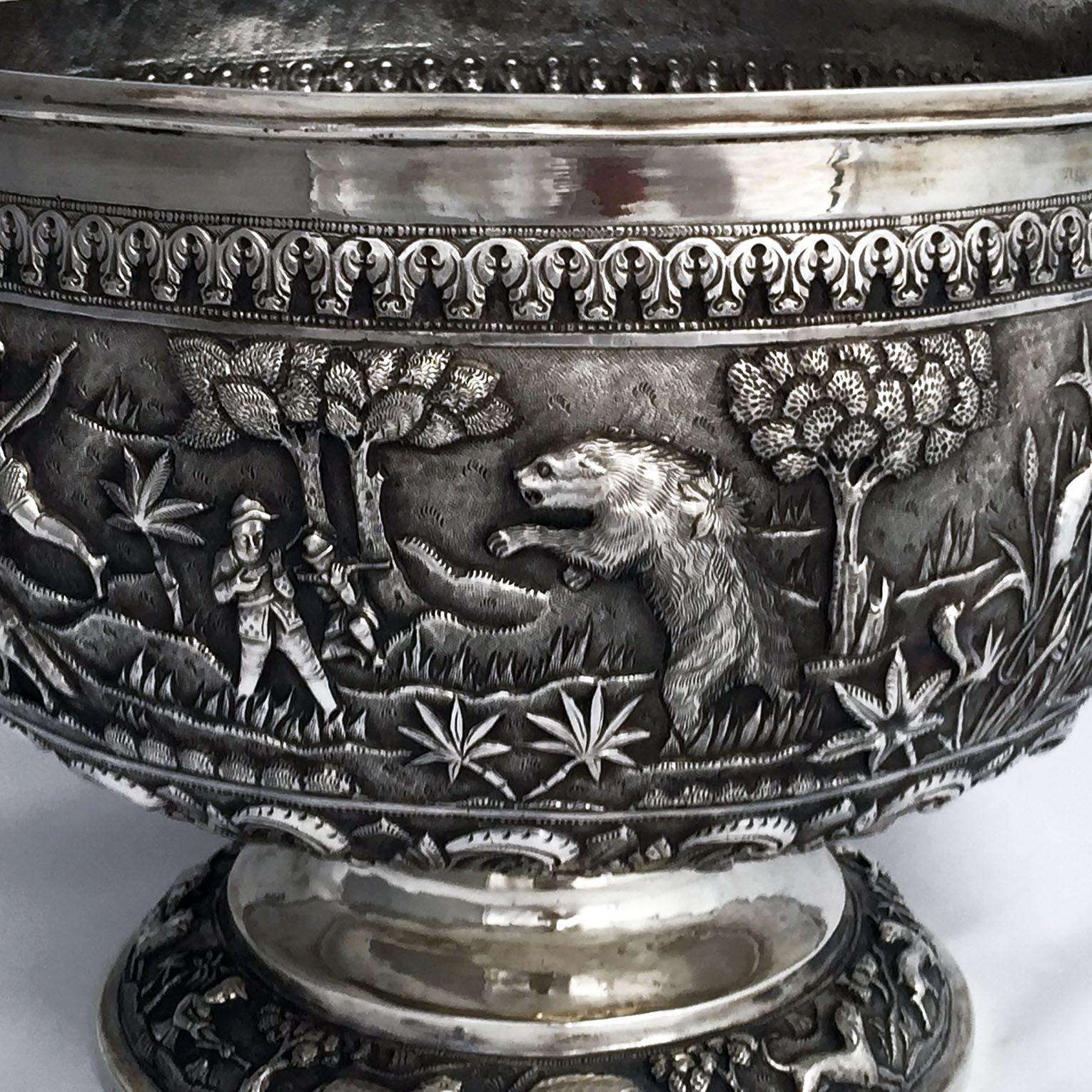 A late 19th century Indian silver punch bowl made for the British Raj - which makes the ultimate champagne cooler.

Each continent is represented in the hunting scenes repousse worked around the raised body. - look out for the Red Indian from the