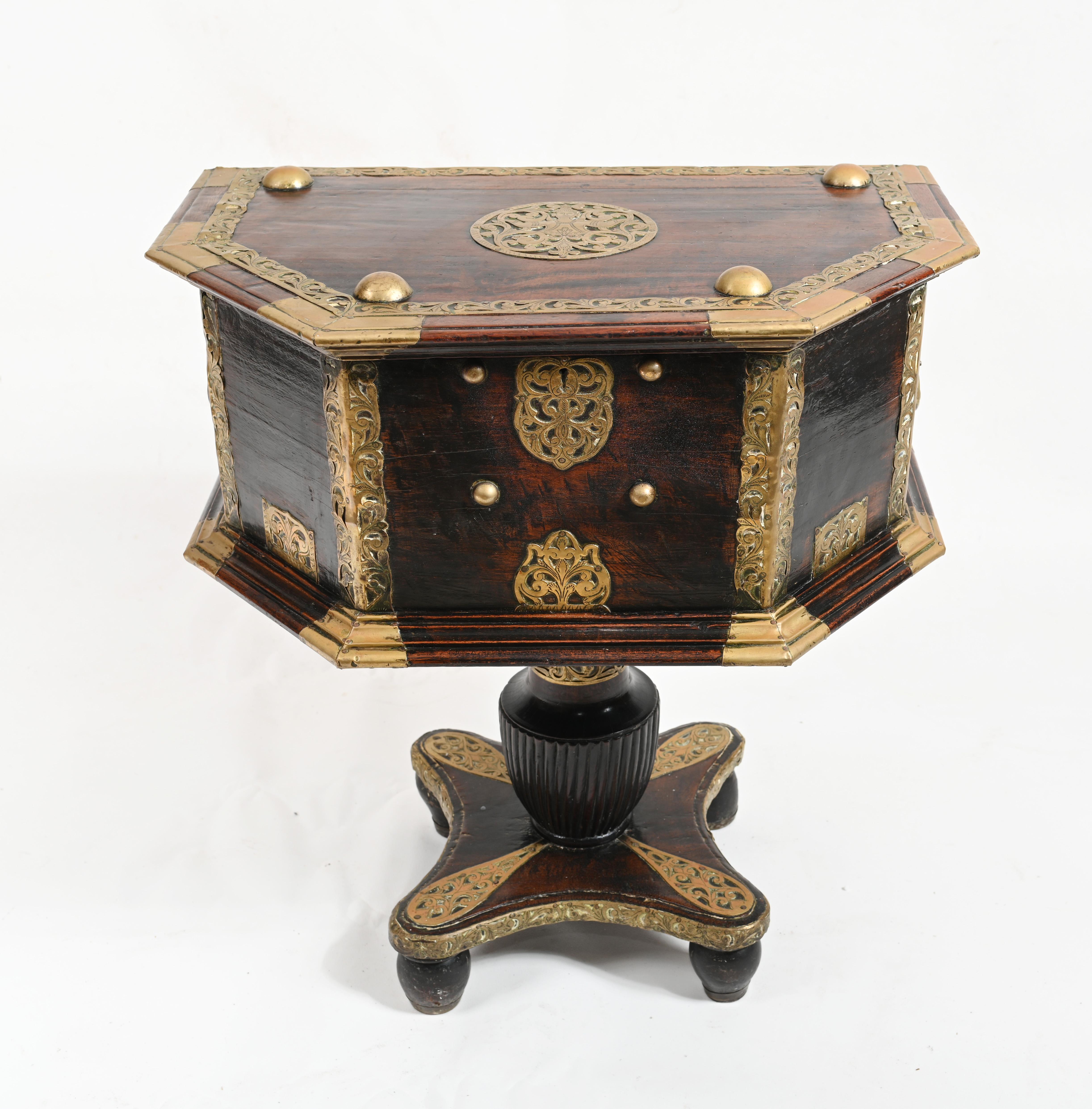 A large dowry chest from the Indian sub continent.
In rosewood embellished with finely casted brass fittings.
Great collectors piece and could function as a side table or cabinet.
Brass fixtures very ornate and features a Hindhu