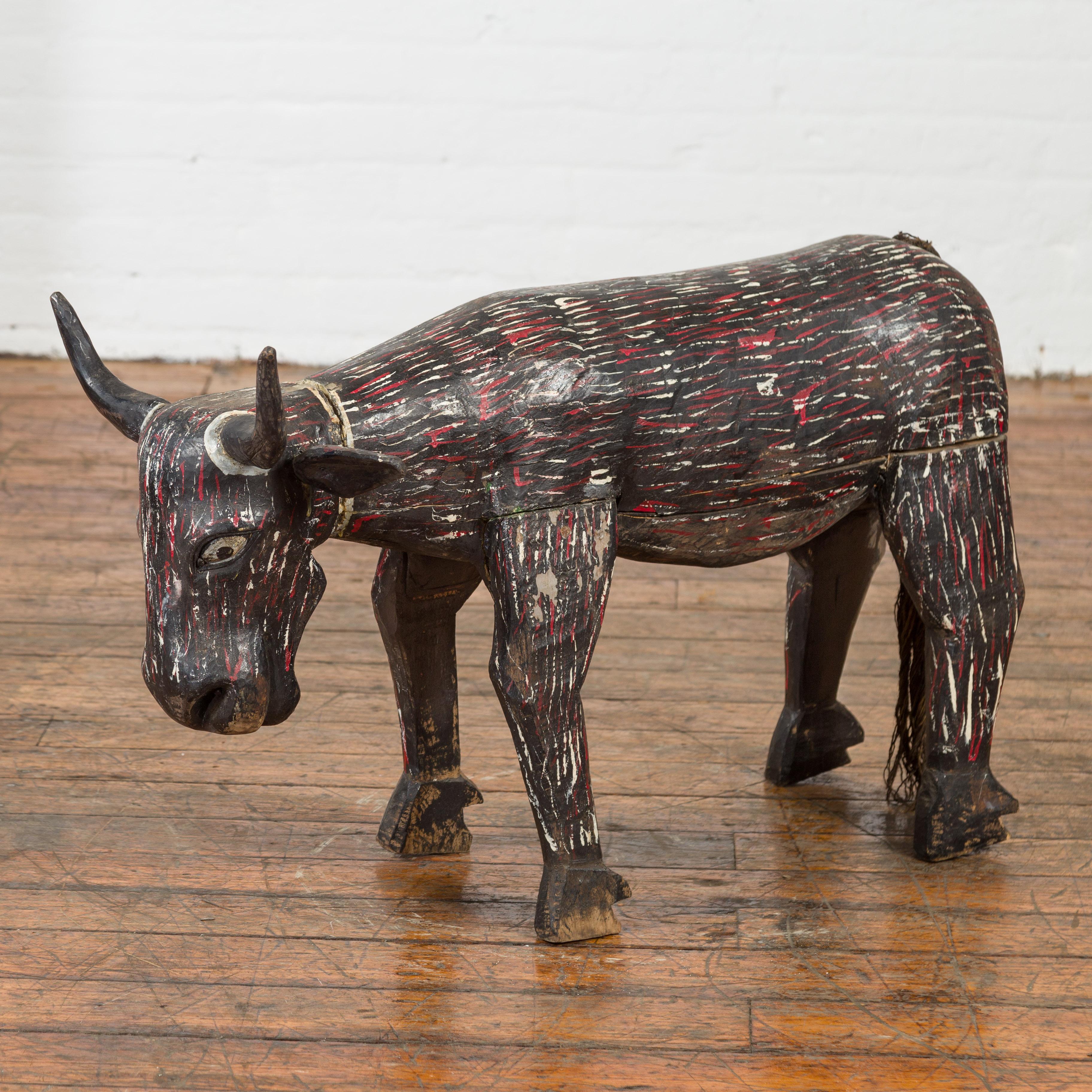 Rustic Indian Early 20th Century Hand Painted Wooden Cow with Distressed Patina For Sale